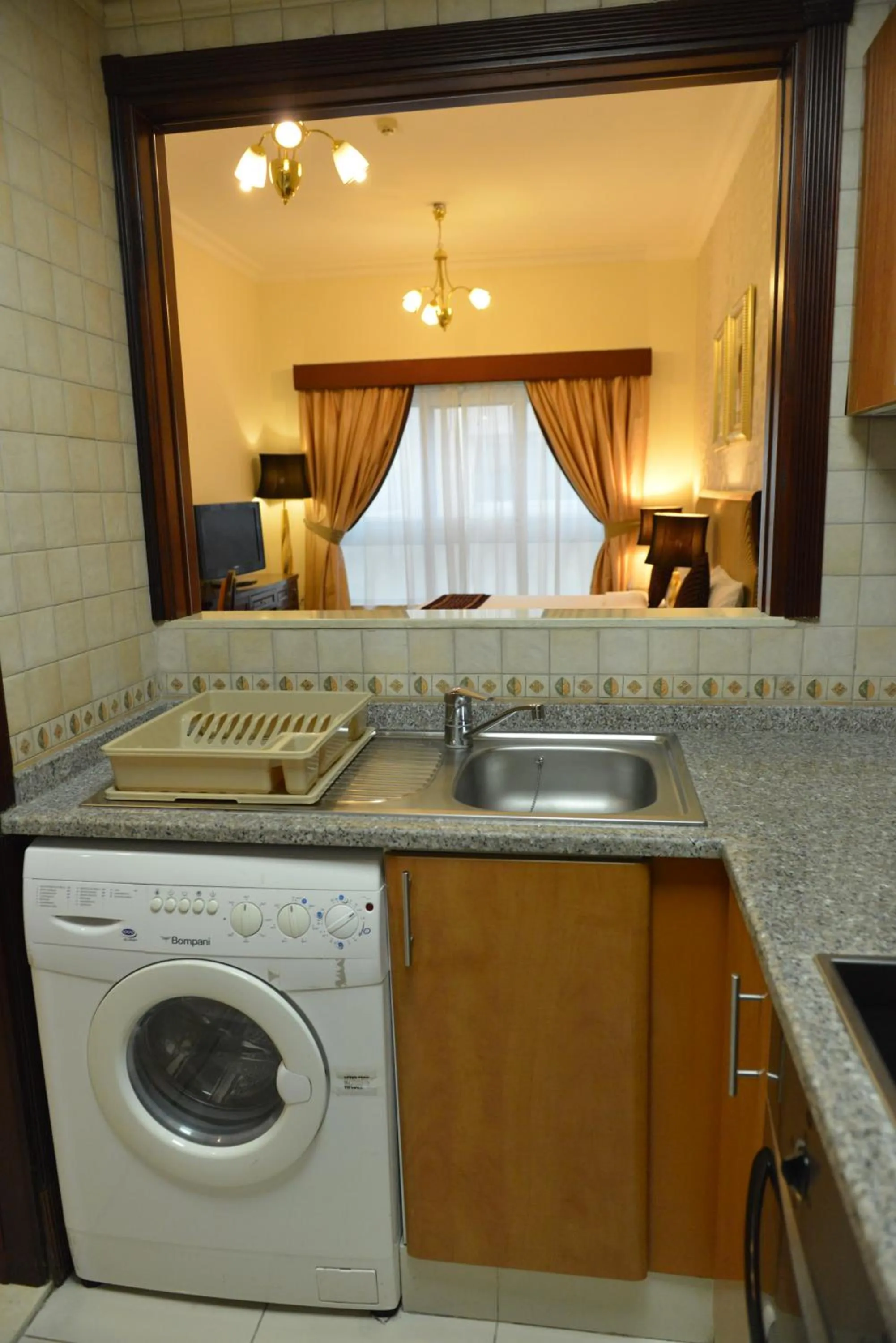 Kitchen or kitchenette in Al Manar Hotel Apartments