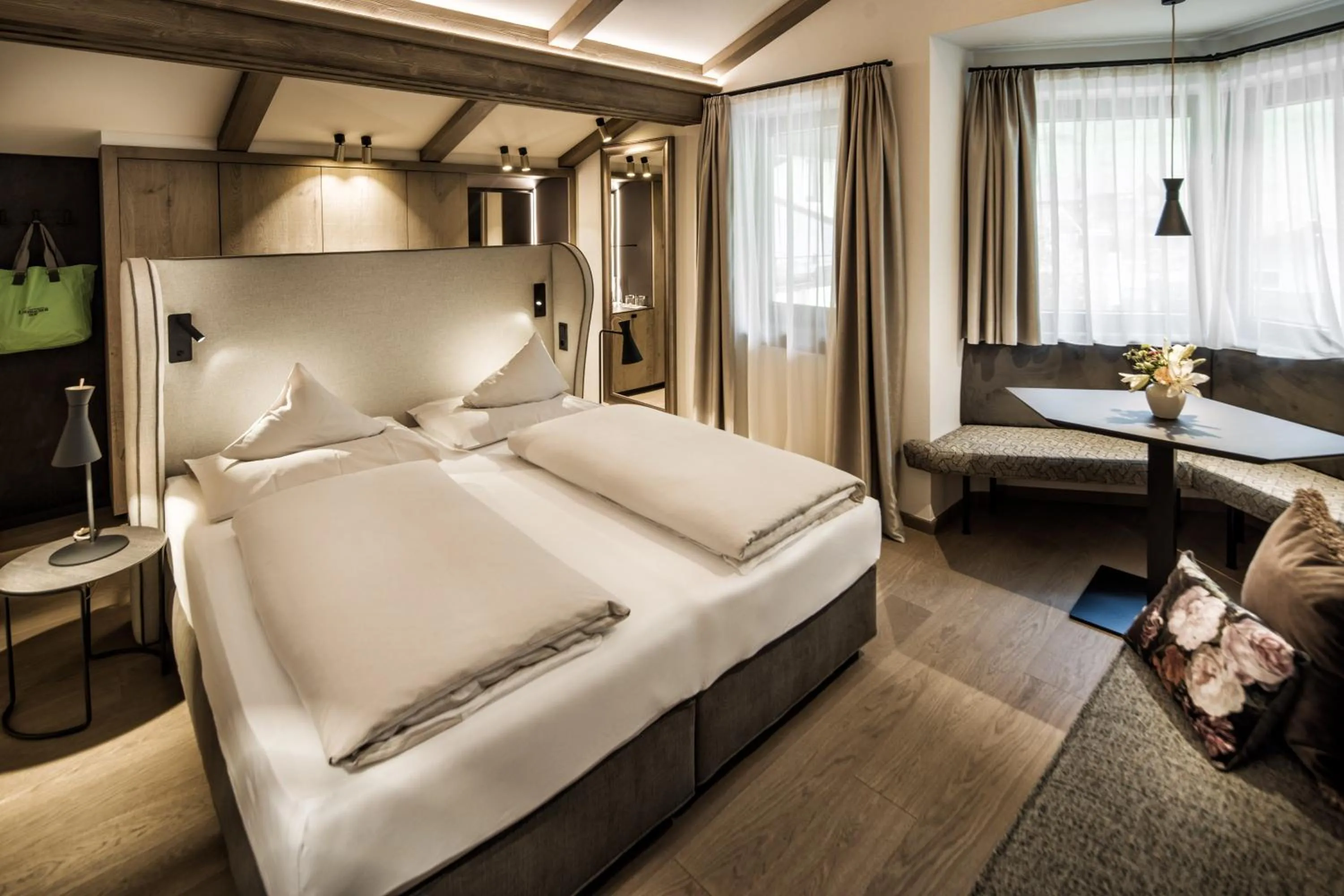Photo of the whole room, Bed in Brugger's Genießerhotel Lanersbacherhof