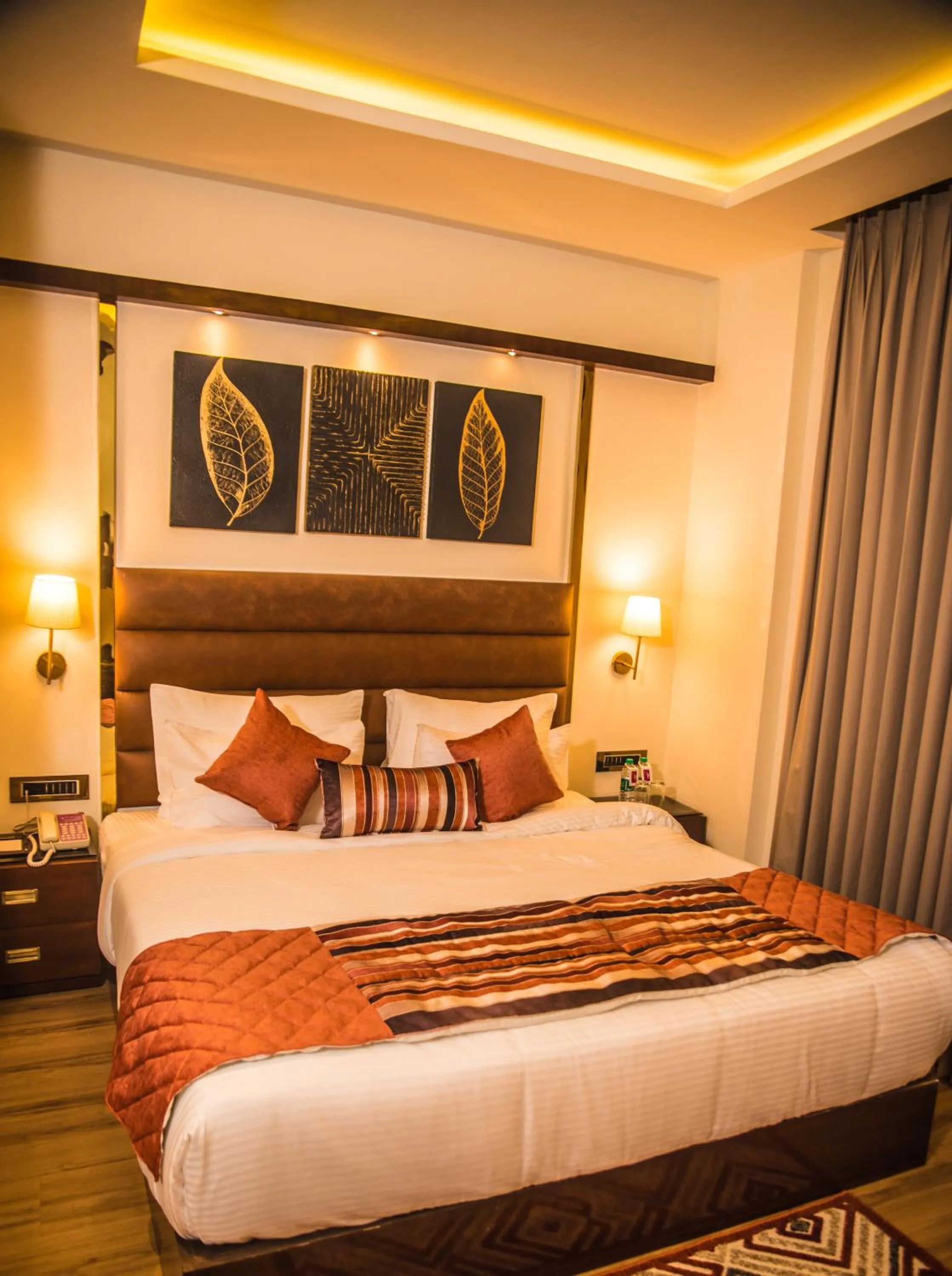 Bedroom, Bed in Regenta Inn Amristar Airport Road by Royal Orchid Hotels Limited