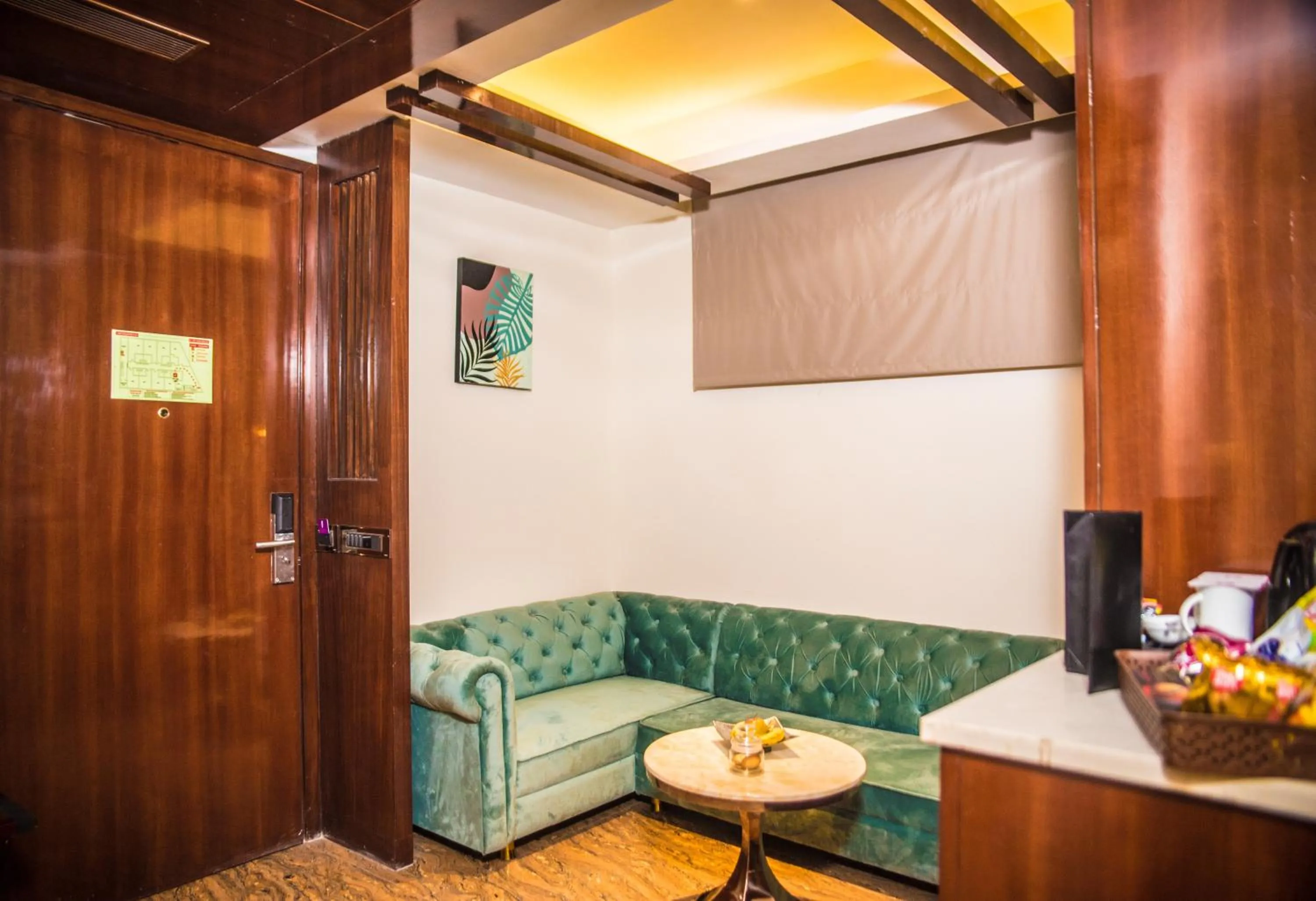 Seating area in Regenta Inn Amristar Airport Road by Royal Orchid Hotels Limited