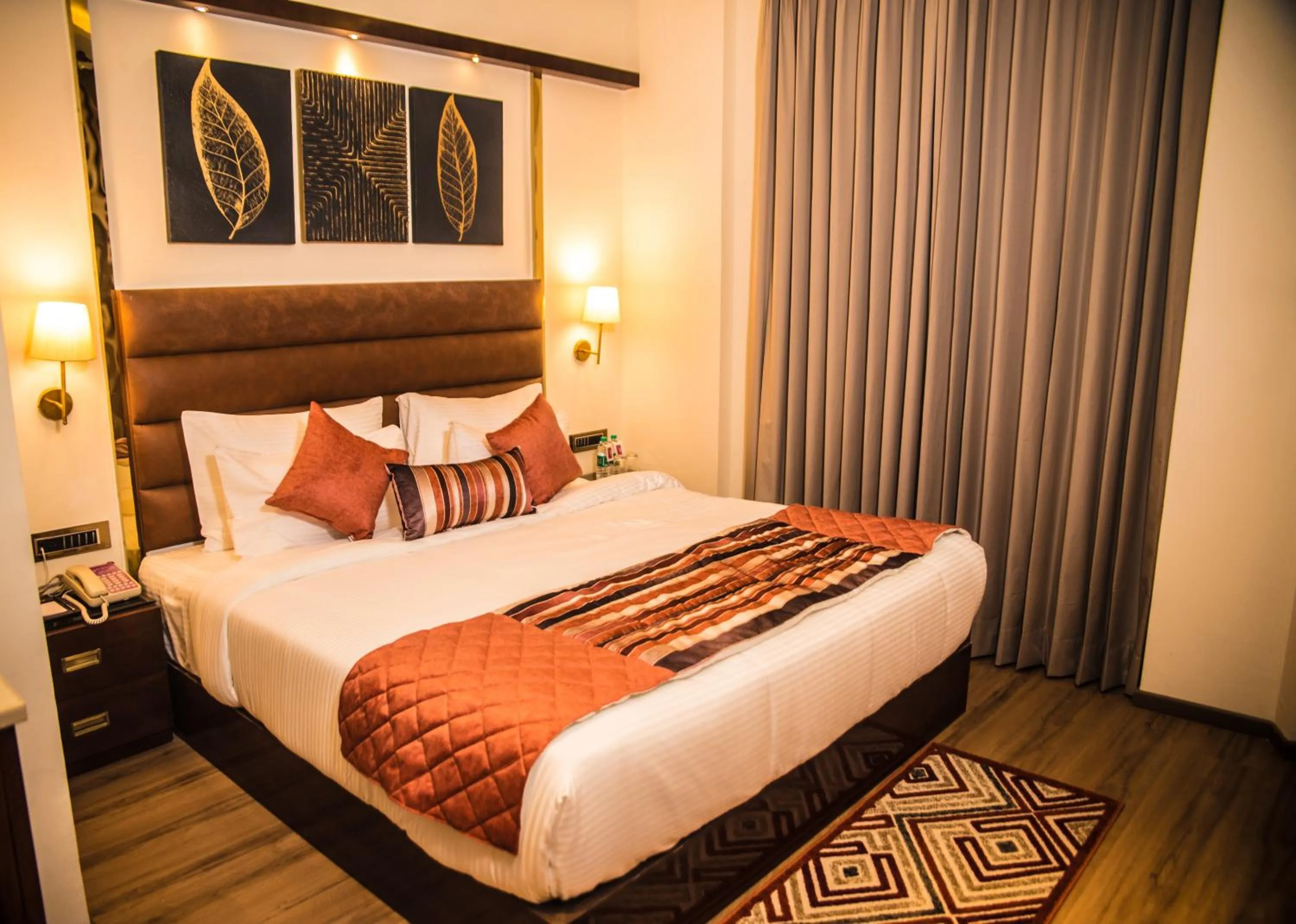 Bedroom, Bed in Regenta Inn Amristar Airport Road by Royal Orchid Hotels Limited