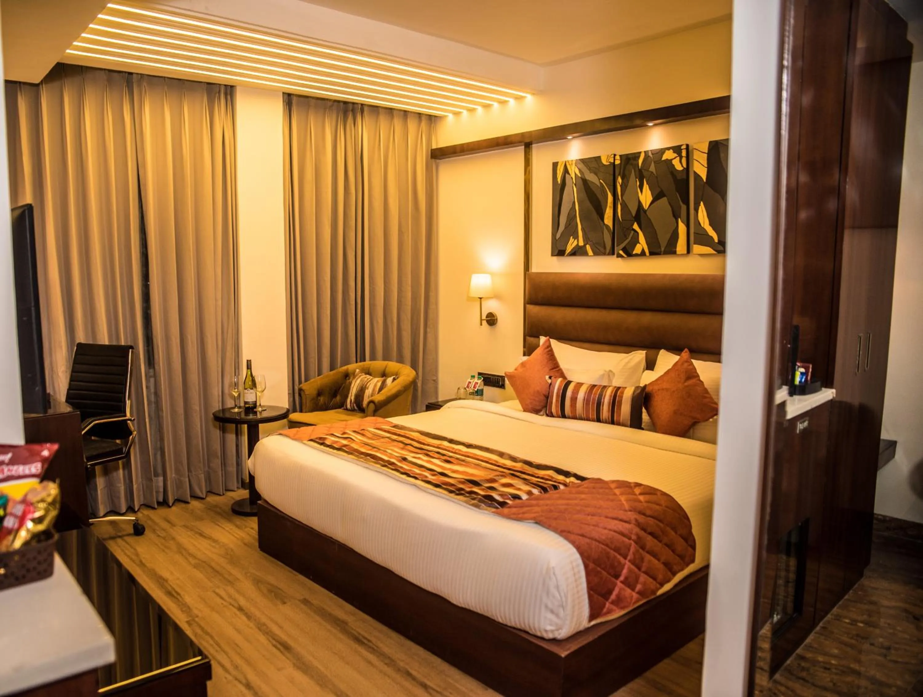 Bedroom, Bed in Regenta Inn Amristar Airport Road by Royal Orchid Hotels Limited