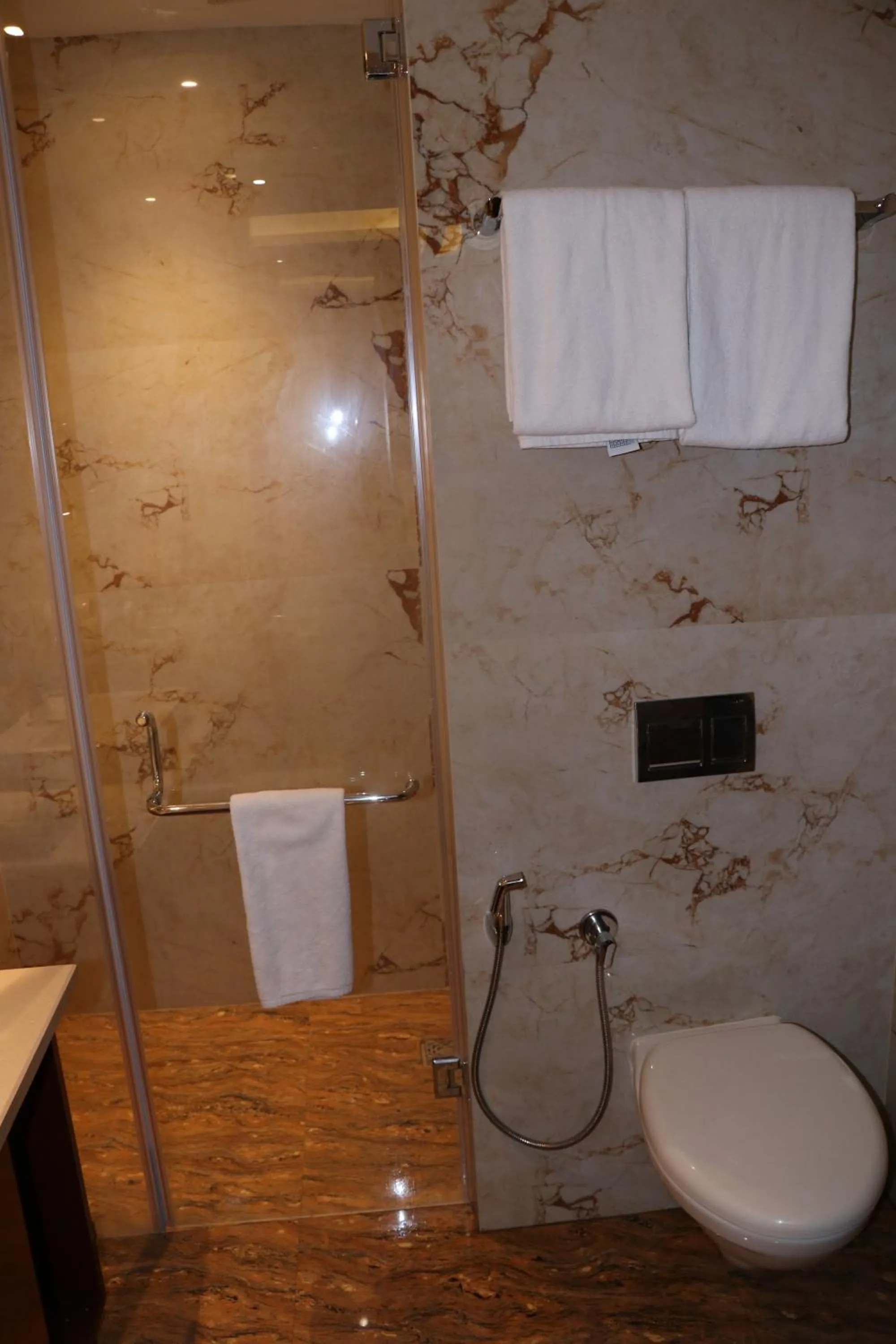 Bathroom in Regenta Inn Amristar Airport Road by Royal Orchid Hotels Limited