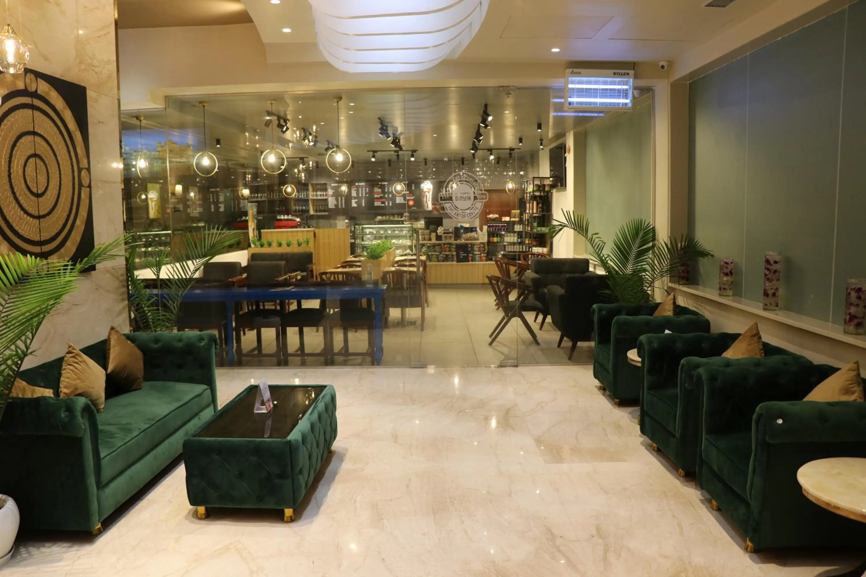 Lobby or reception in Regenta Inn Amristar Airport Road by Royal Orchid Hotels Limited