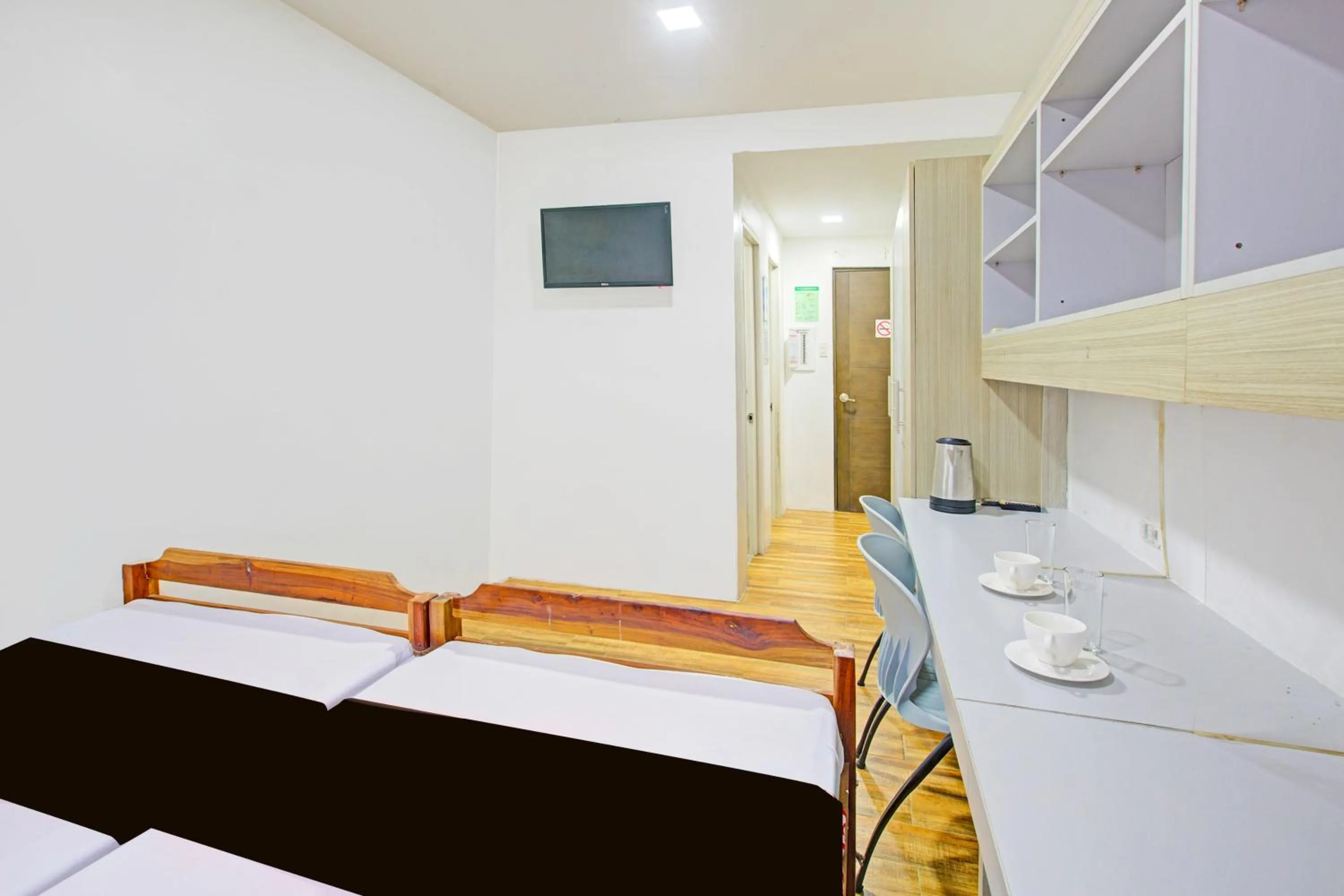 Photo of the whole room, Bed in Collection O Metro Manila near University Belt formerly 1318 Residences