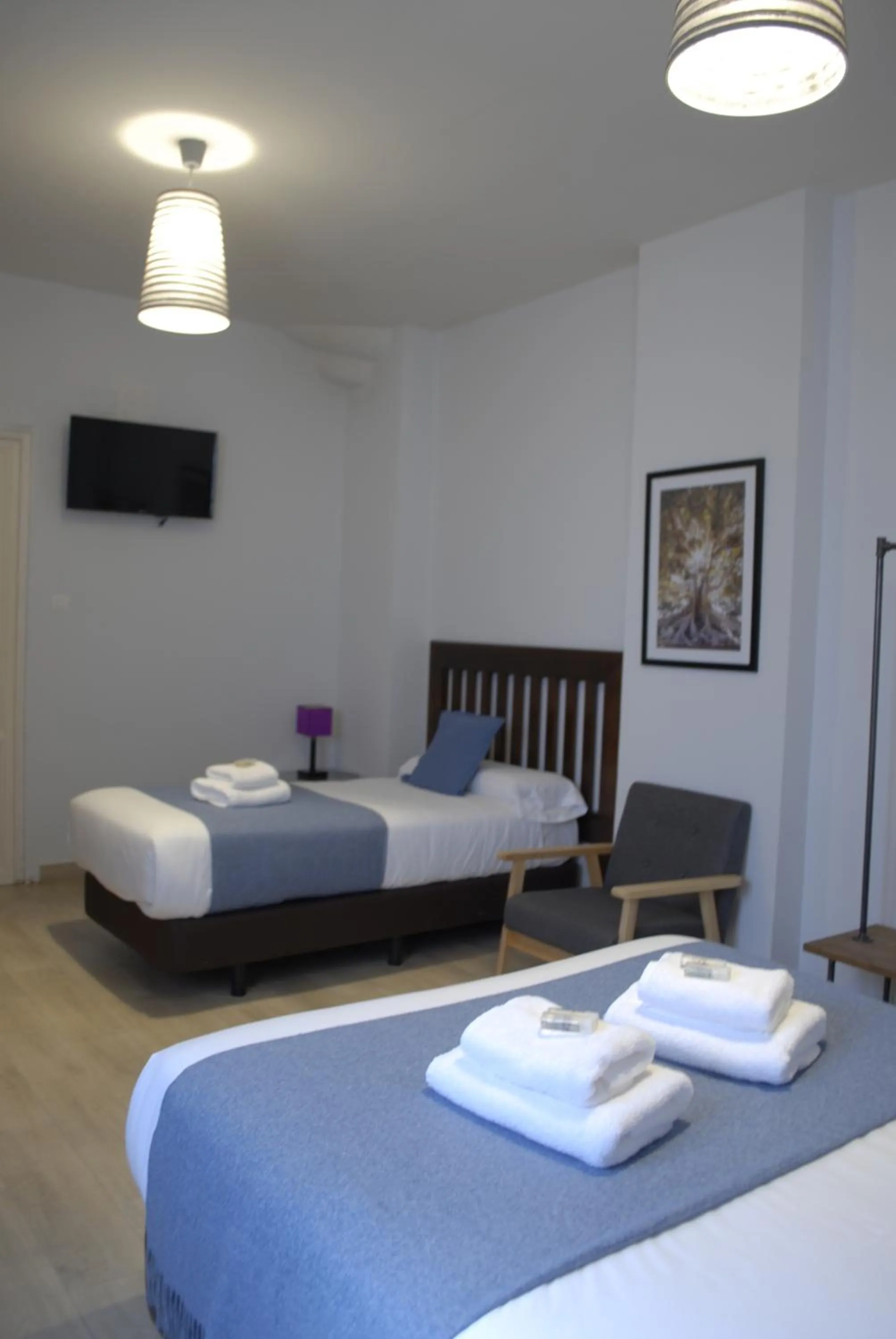 Photo of the whole room, Bed in La Perla Granada Suites