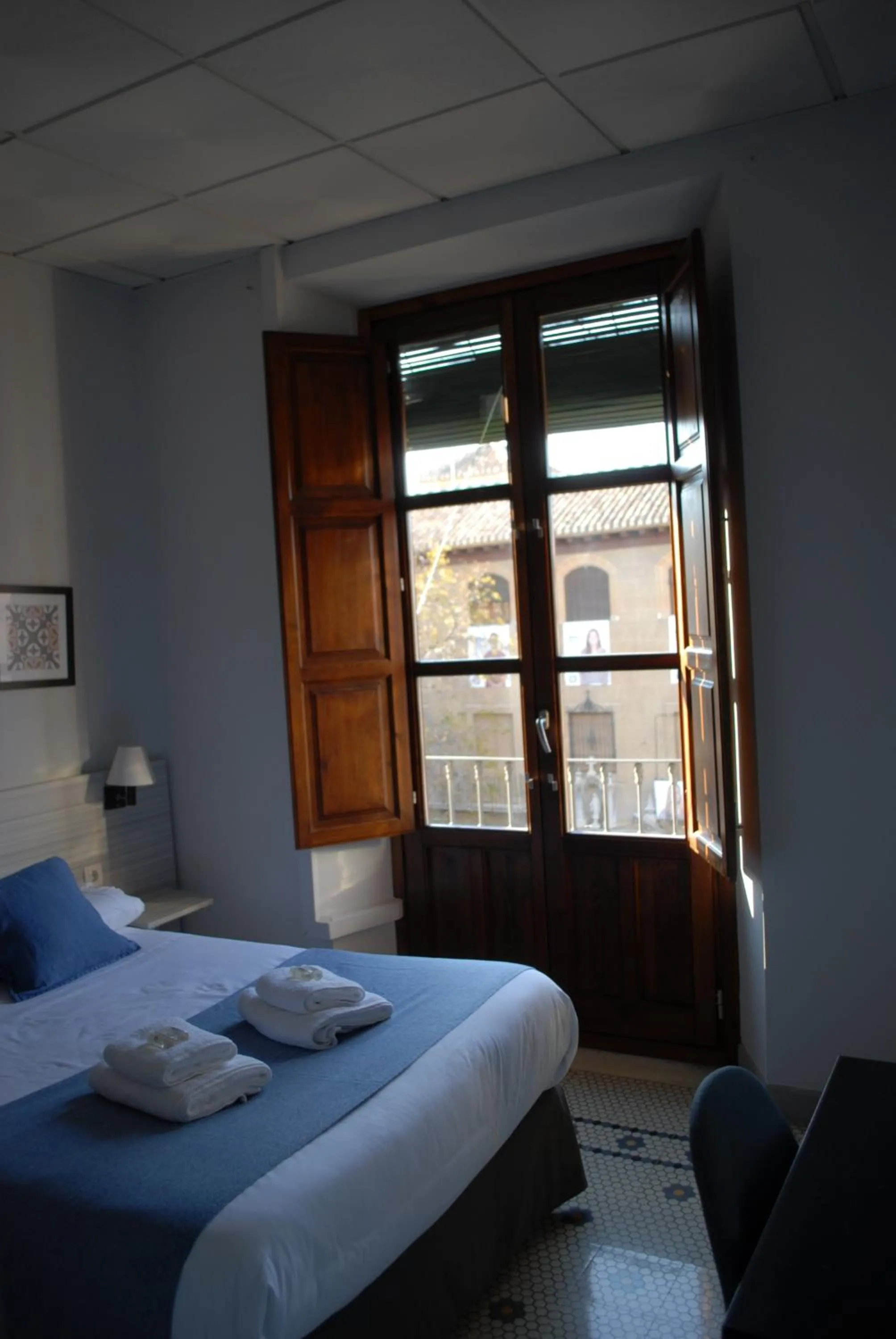View (from property/room), Bed in La Perla Granada Suites