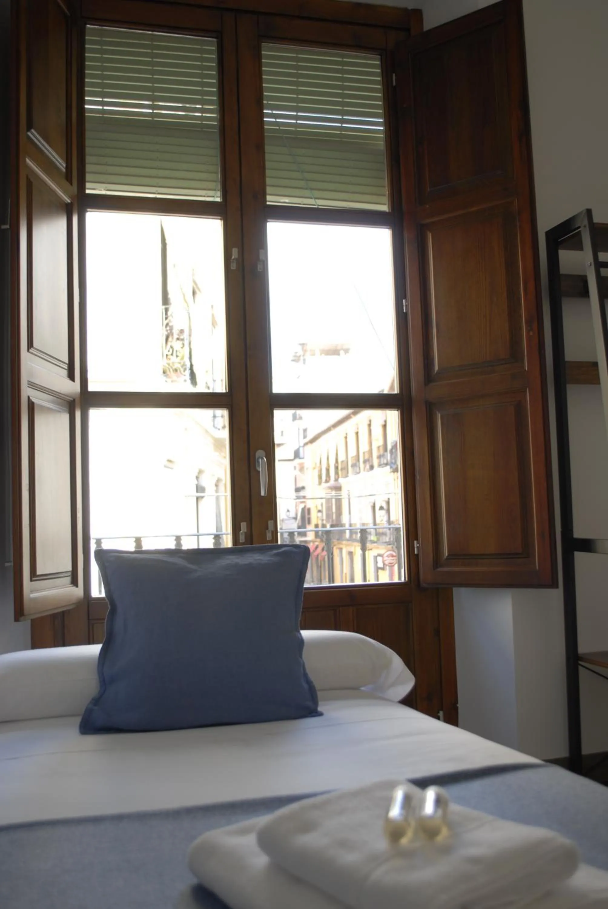 View (from property/room), Bed in La Perla Granada Suites