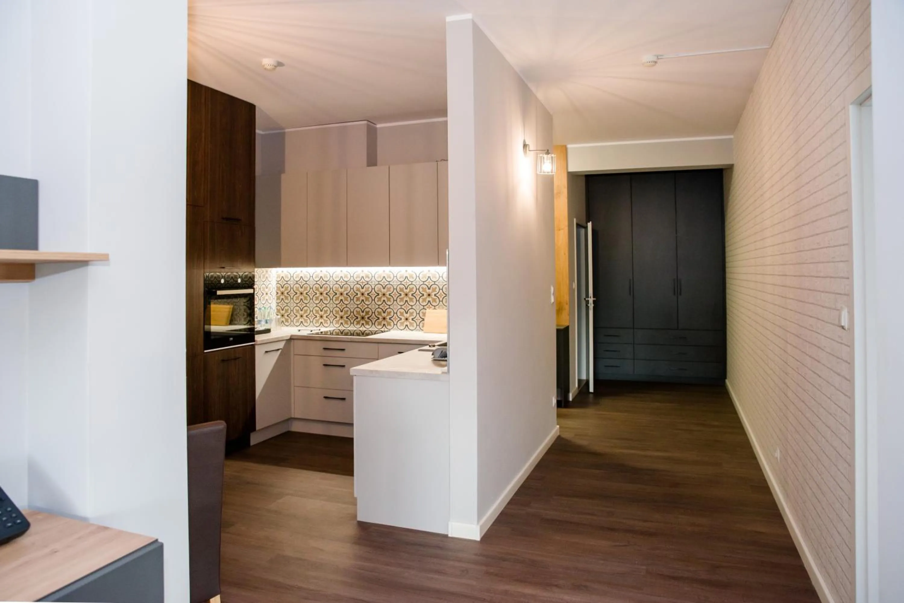 Kitchen or kitchenette, Bed in Hotel 107