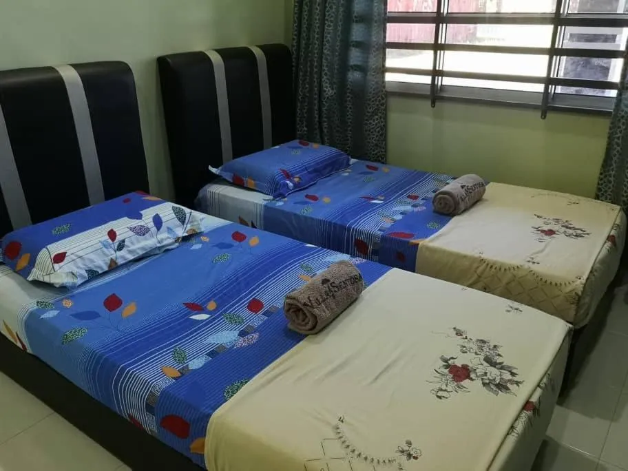 Bed in VILLA SENTOSA