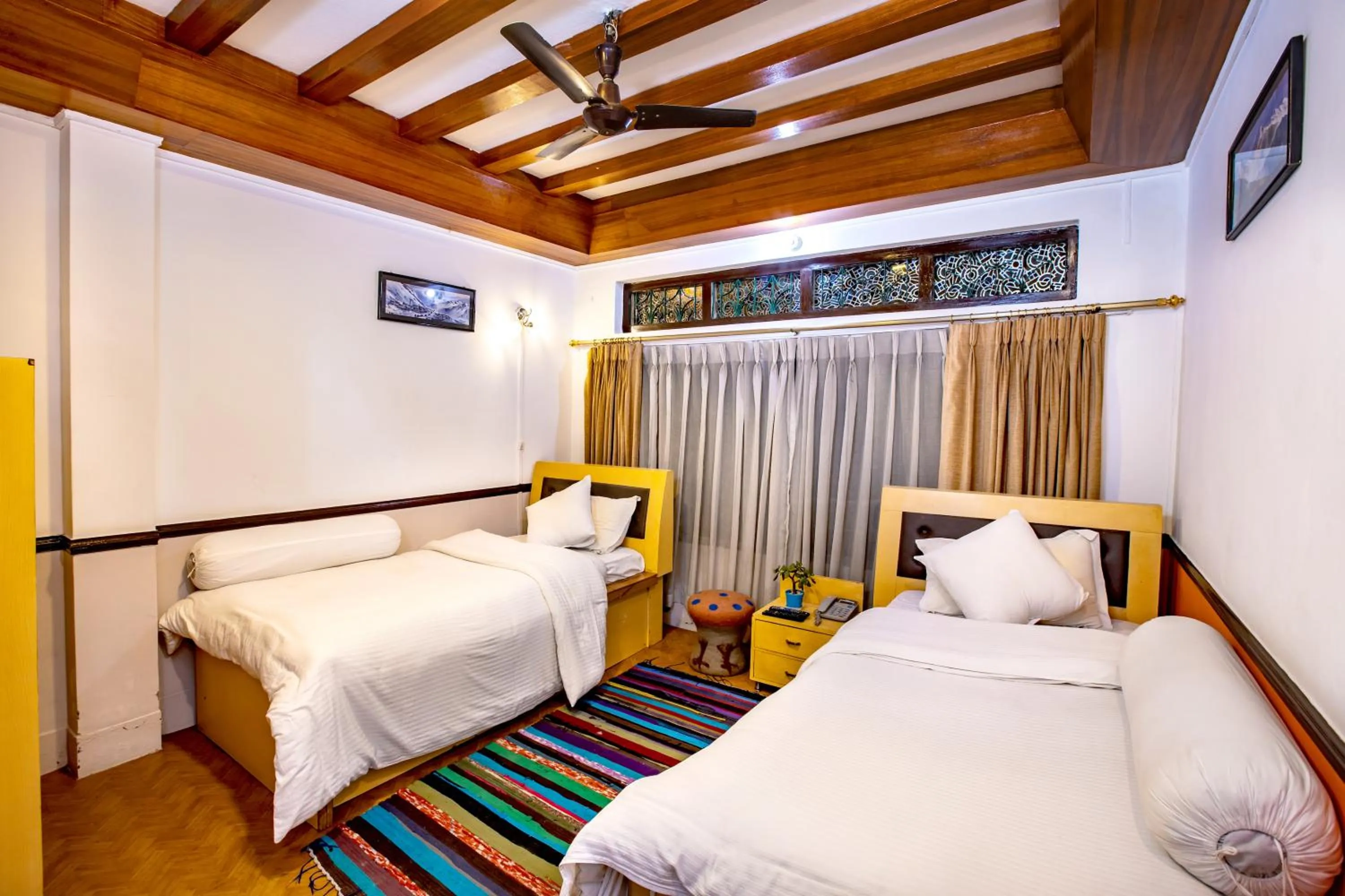 Bed in Shangrila Boutique Hotel