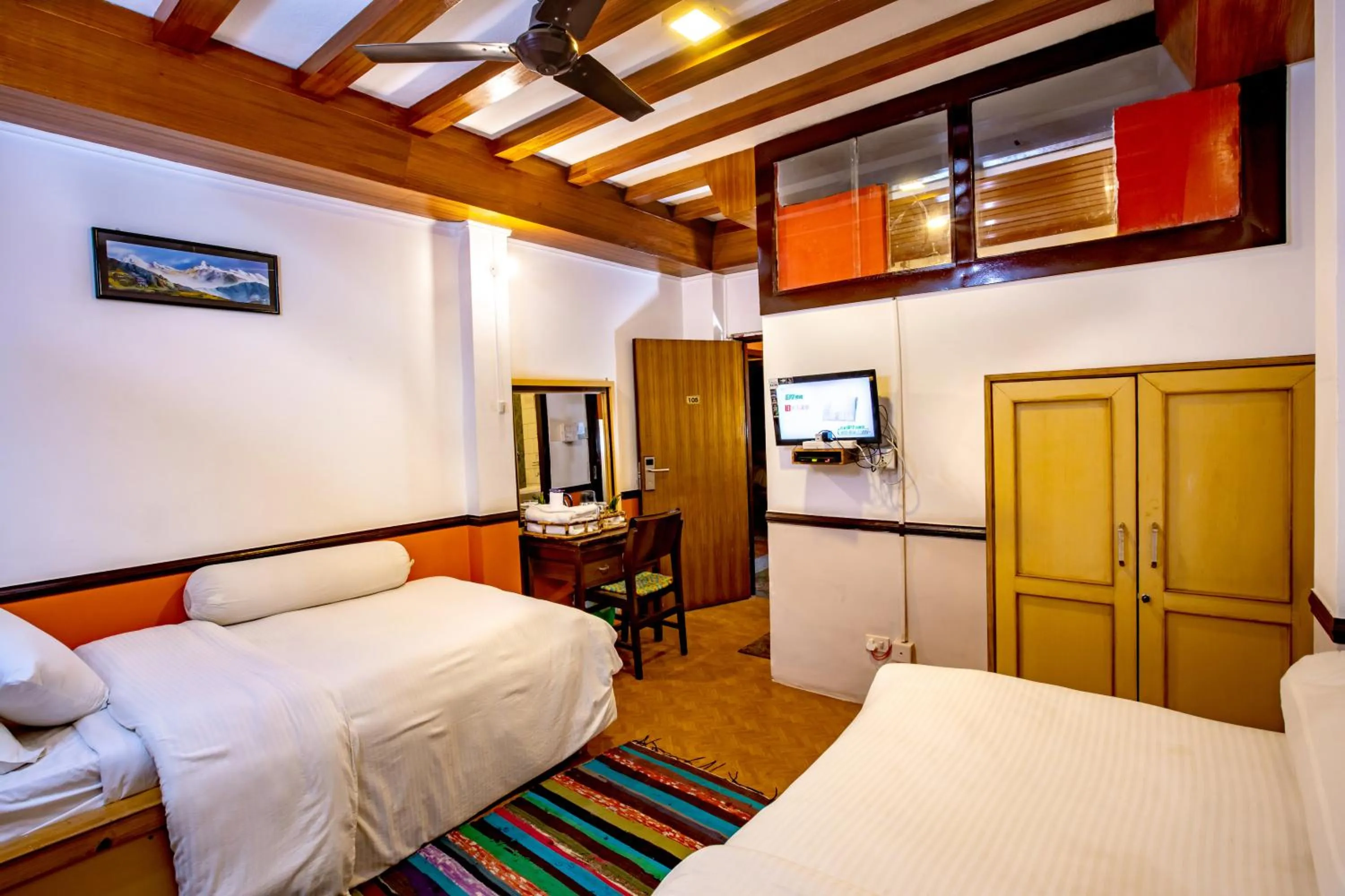 Bed in Shangrila Boutique Hotel