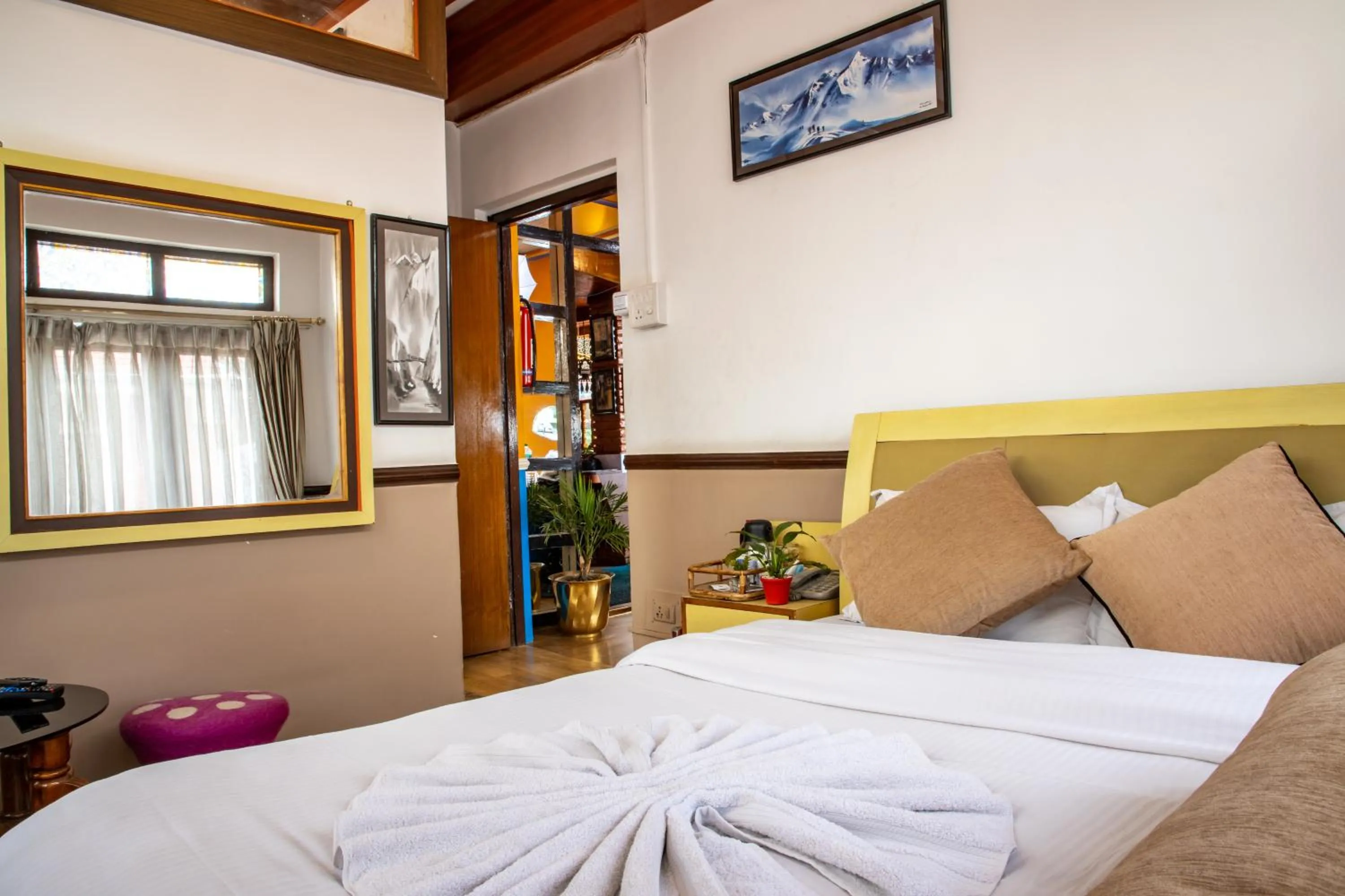 Bed in Shangrila Boutique Hotel