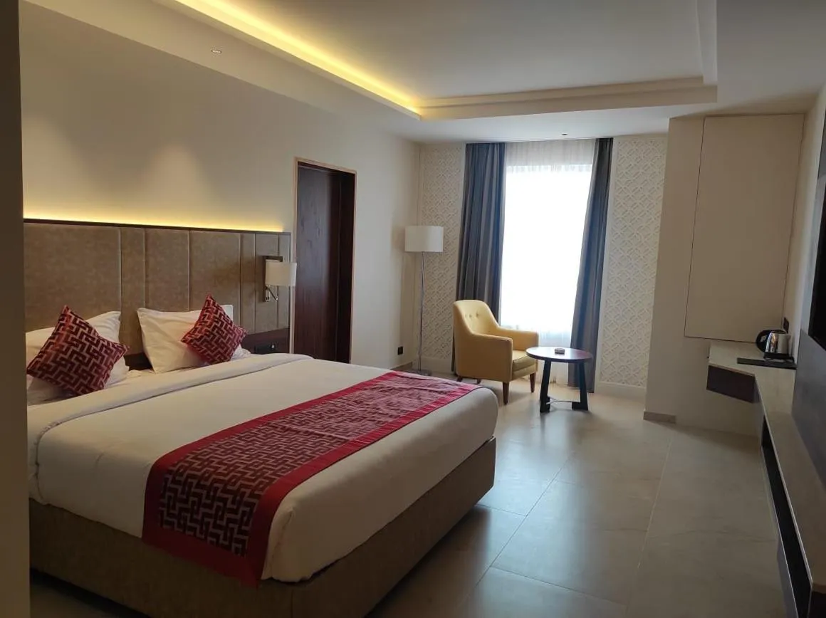 Photo of the whole room, Bed in AARYA MANSION V One Hotel