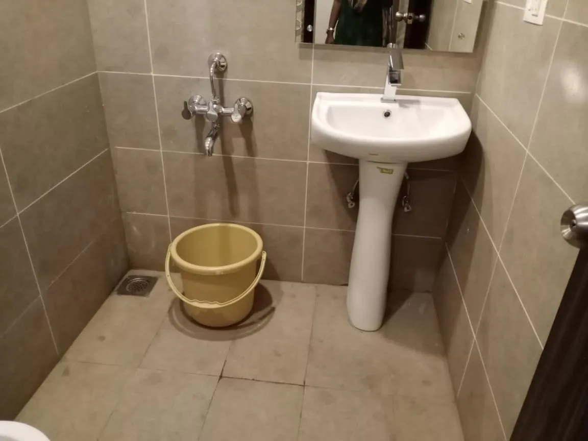 Bathroom in AARYA MANSION V One Hotel