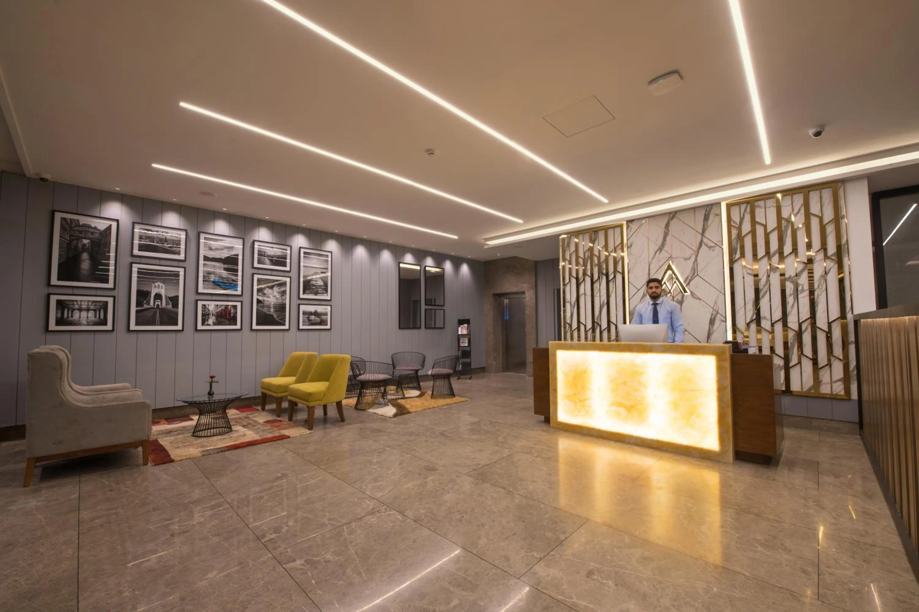 Staff in AARYA MANSION V One Hotel