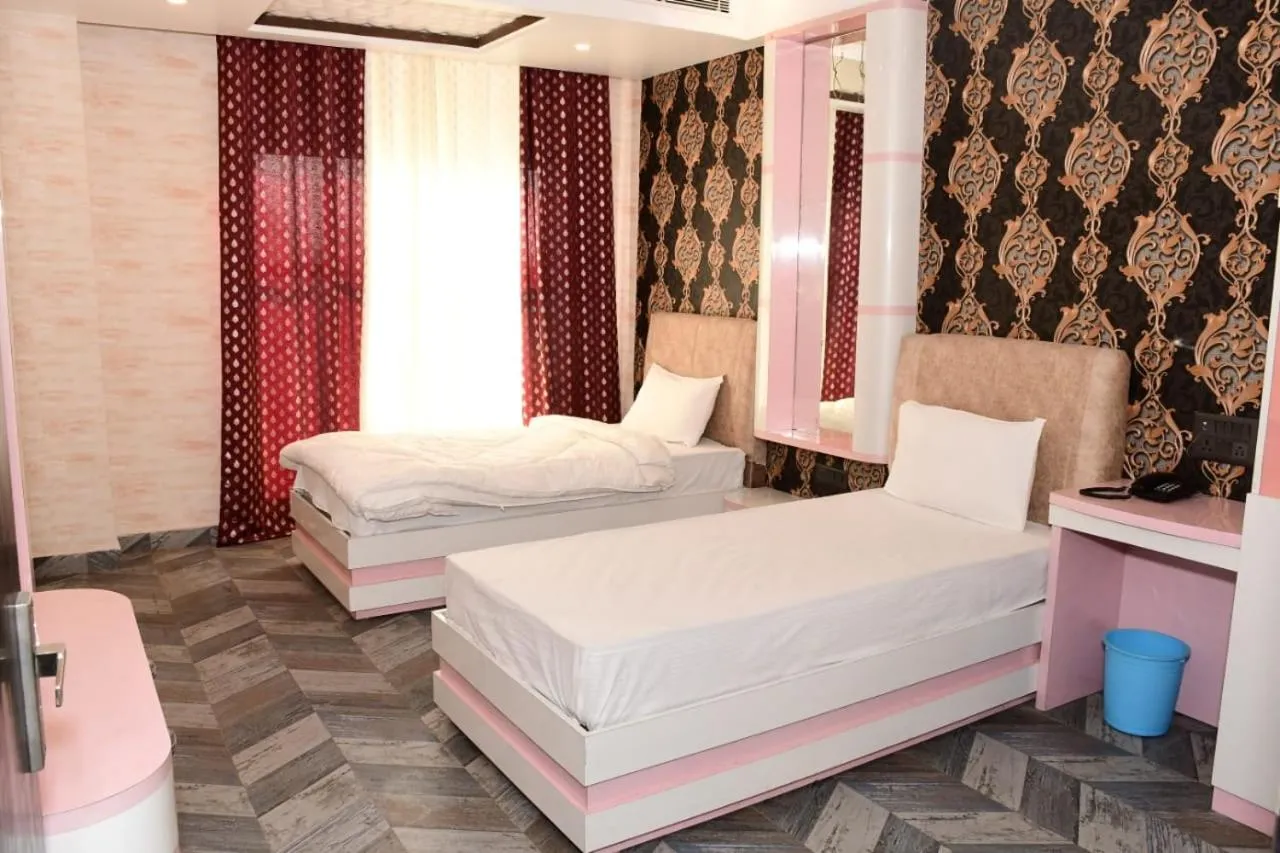 Bed in HOTEL PLEASANT VIEW