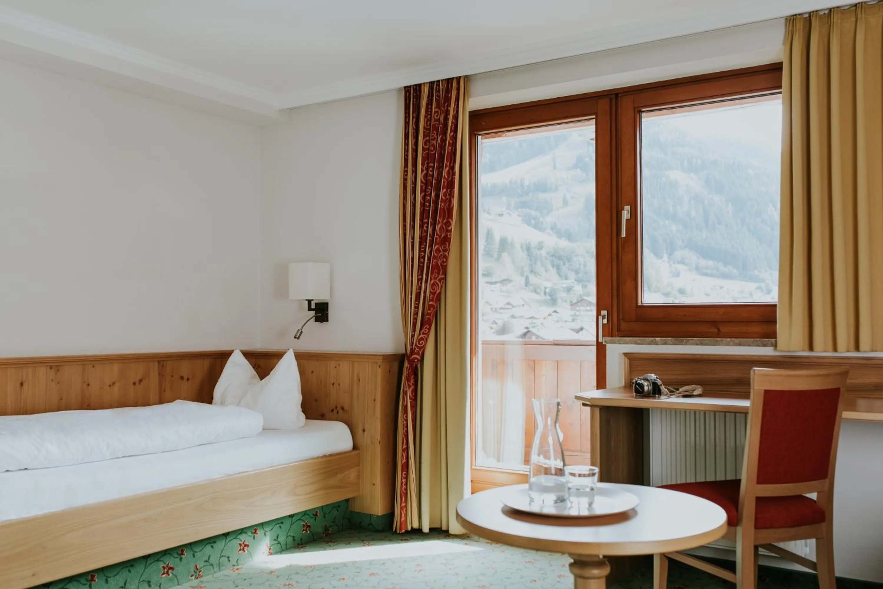 Bed in Hotel Tauernhof