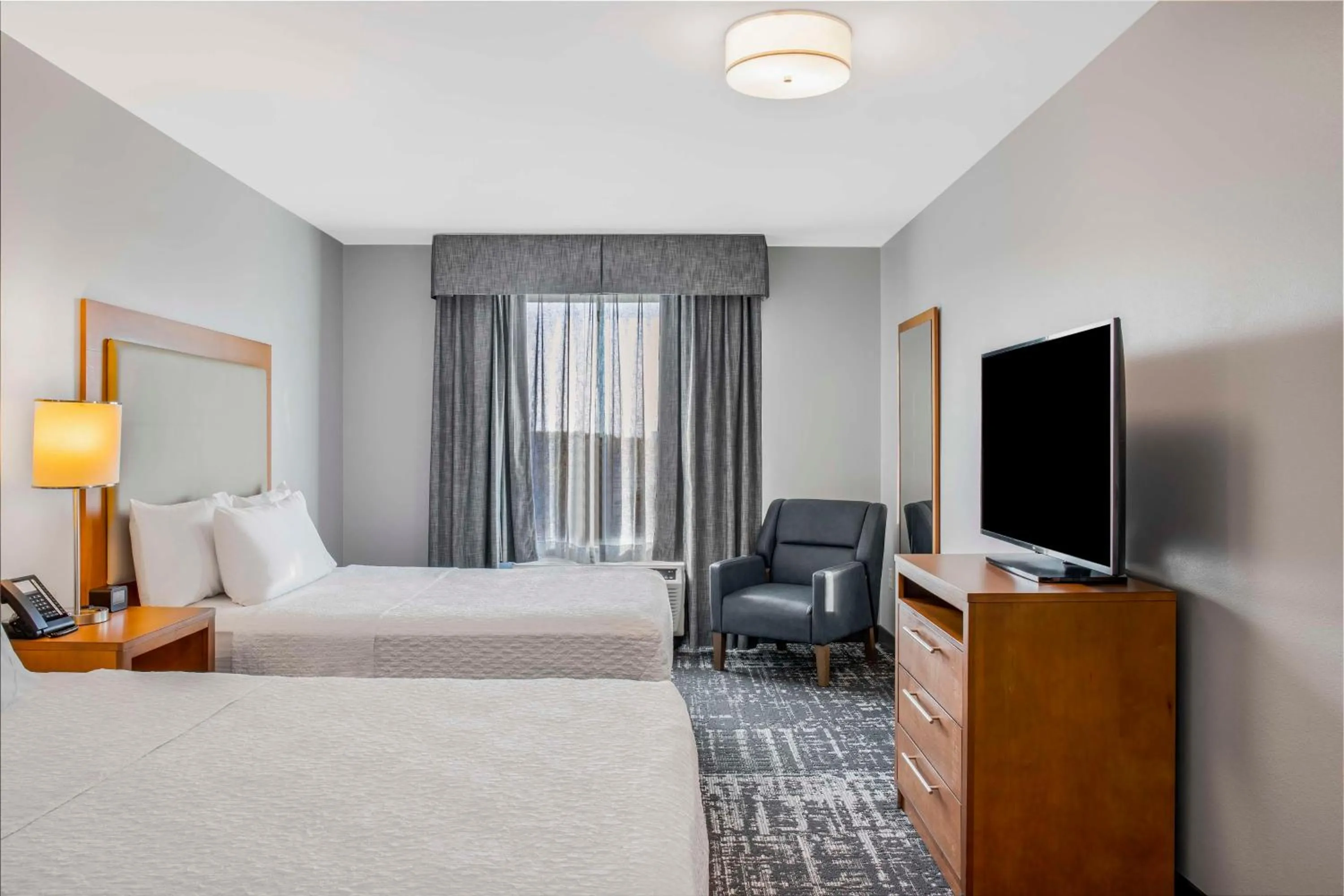 Bed in Homewood Suites by Hilton Winnipeg Airport - Polo Park