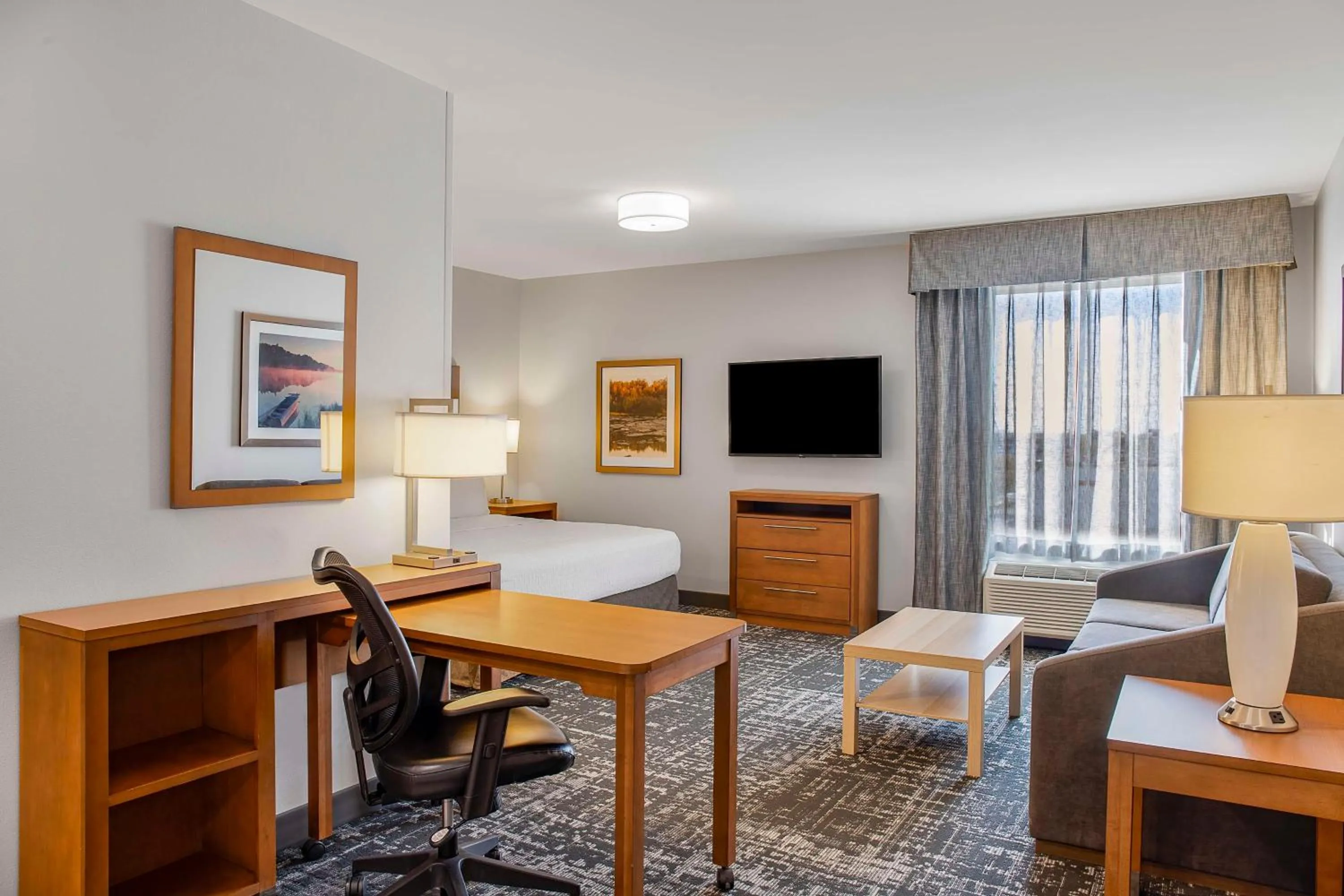 Living room in Homewood Suites by Hilton Winnipeg Airport - Polo Park