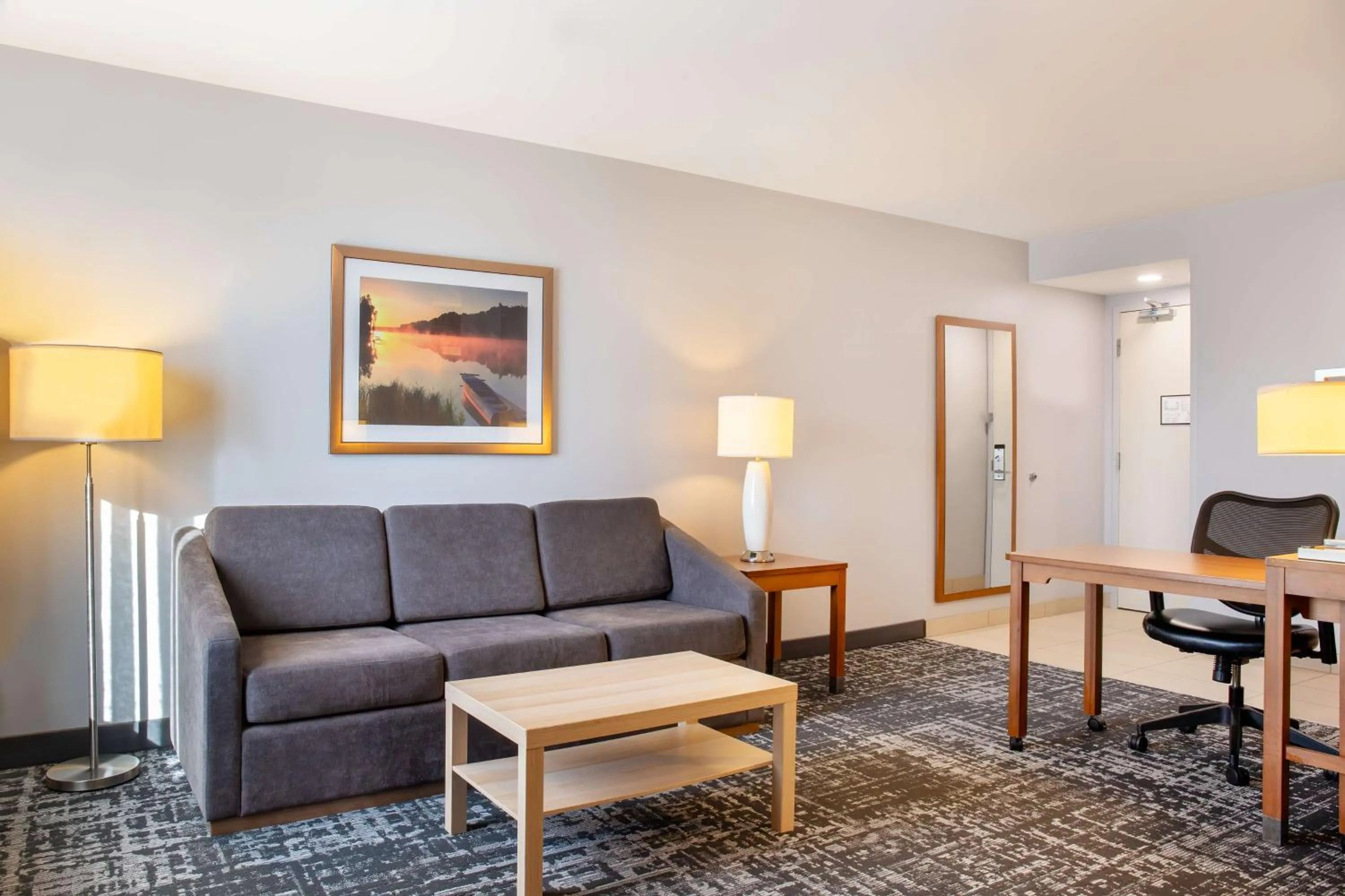 Living room in Homewood Suites by Hilton Winnipeg Airport - Polo Park