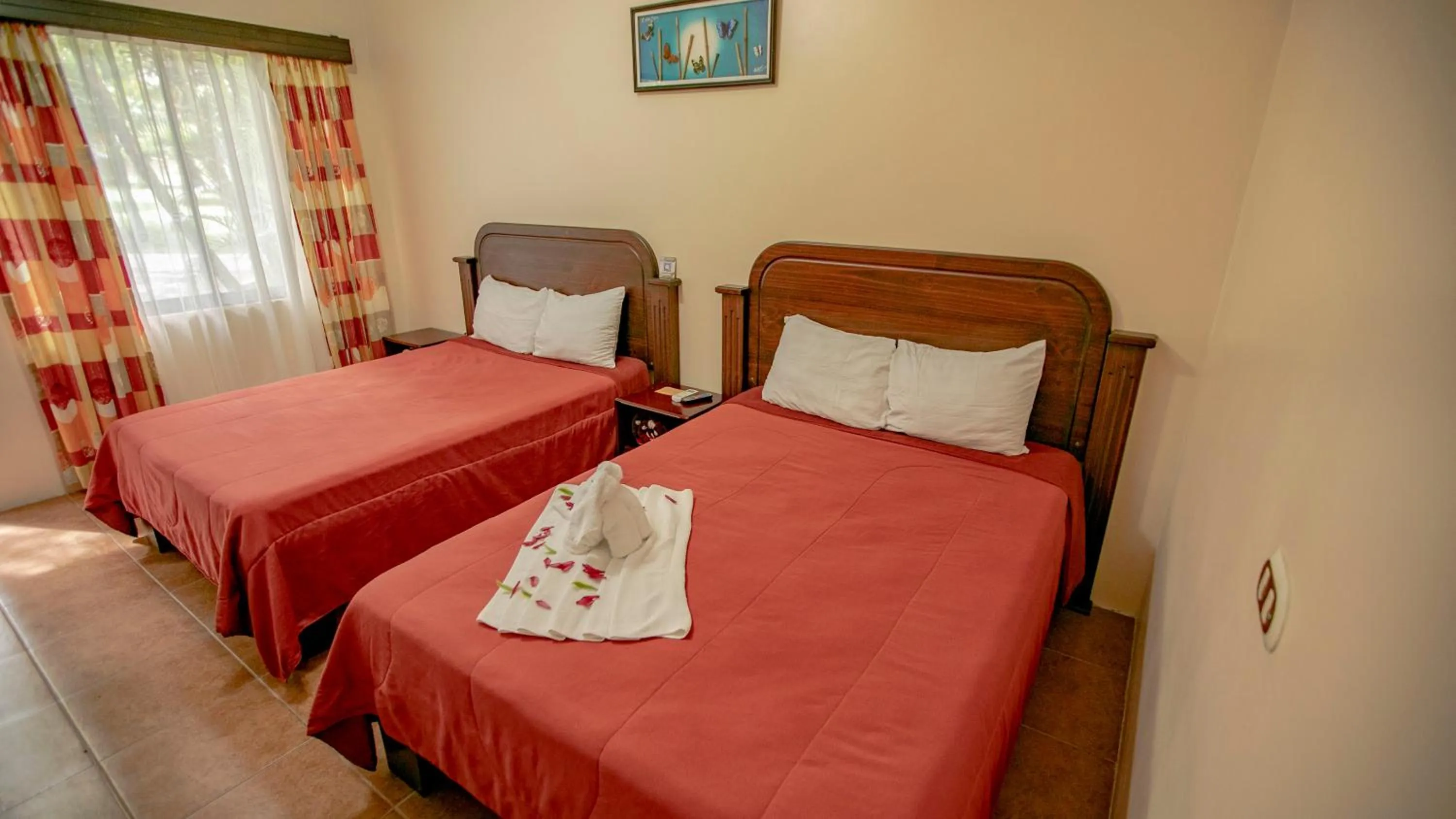 Photo of the whole room, Bed in Orquideas Boutique Hotel