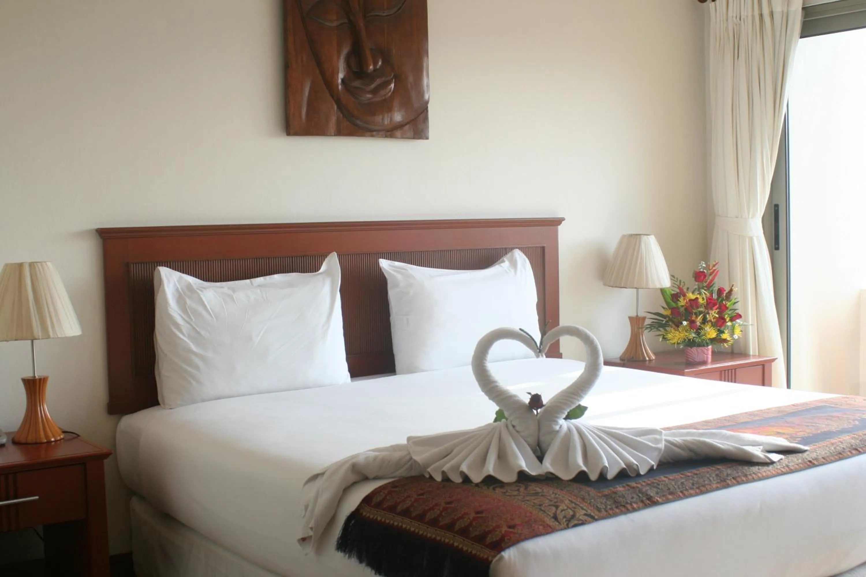 Bed in Palmview Resort