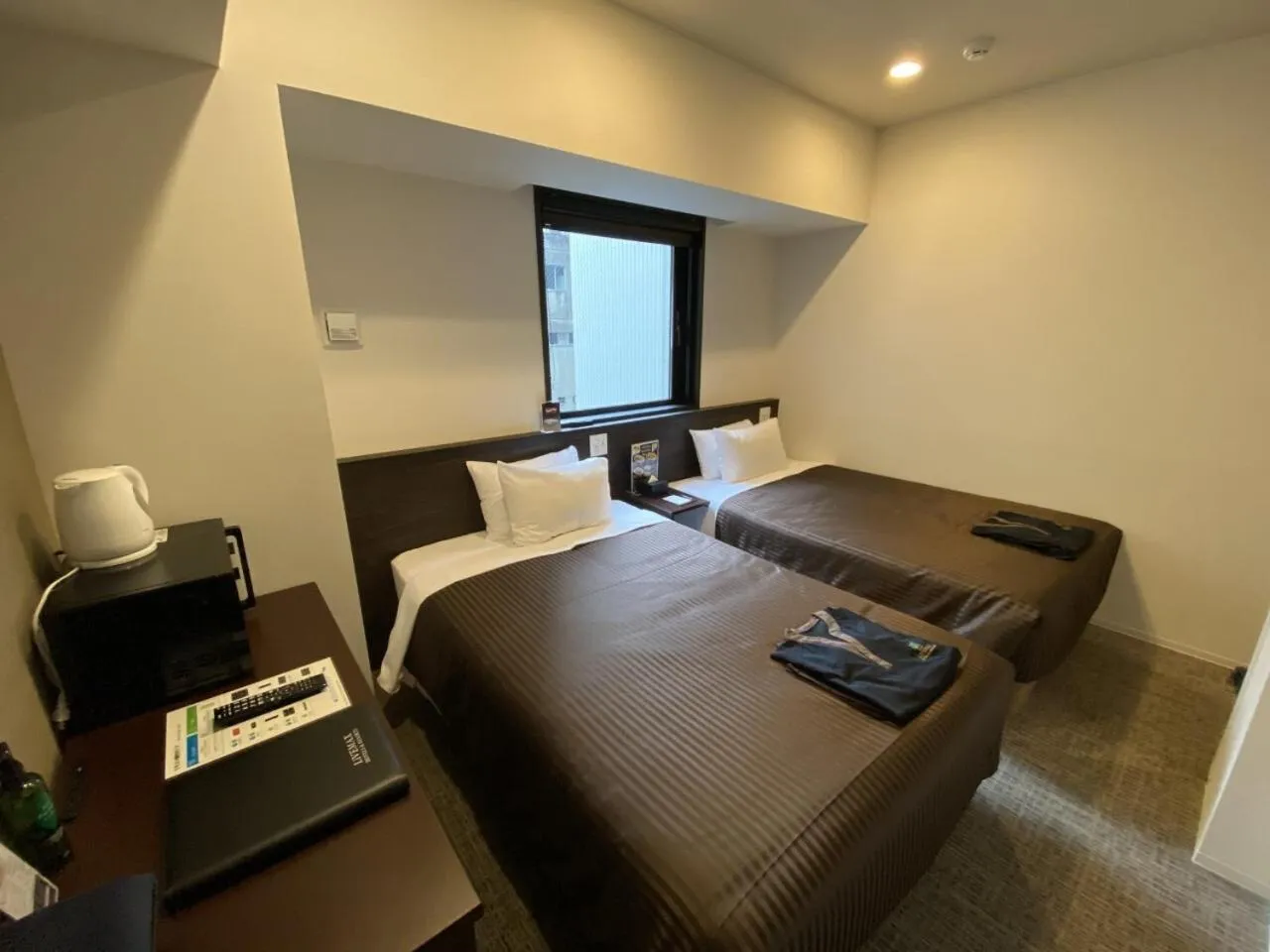 Bed in HOTEL LiVEMAX PREMIUM Nagoya Marunouchi