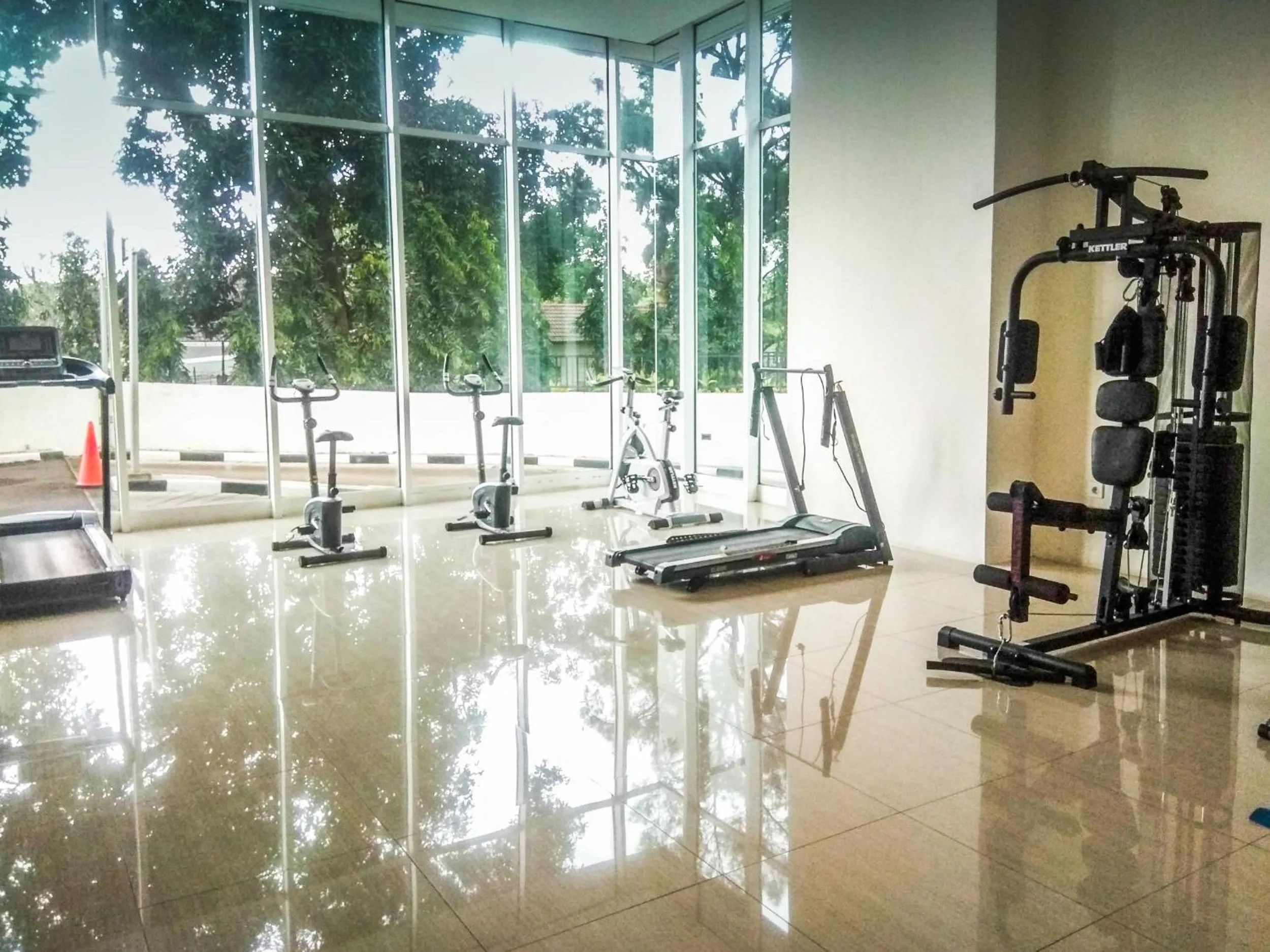 Fitness centre/facilities in Fully Furnished Apartment with Comfortable Design 1BR Woodland Park Residence By Travelio