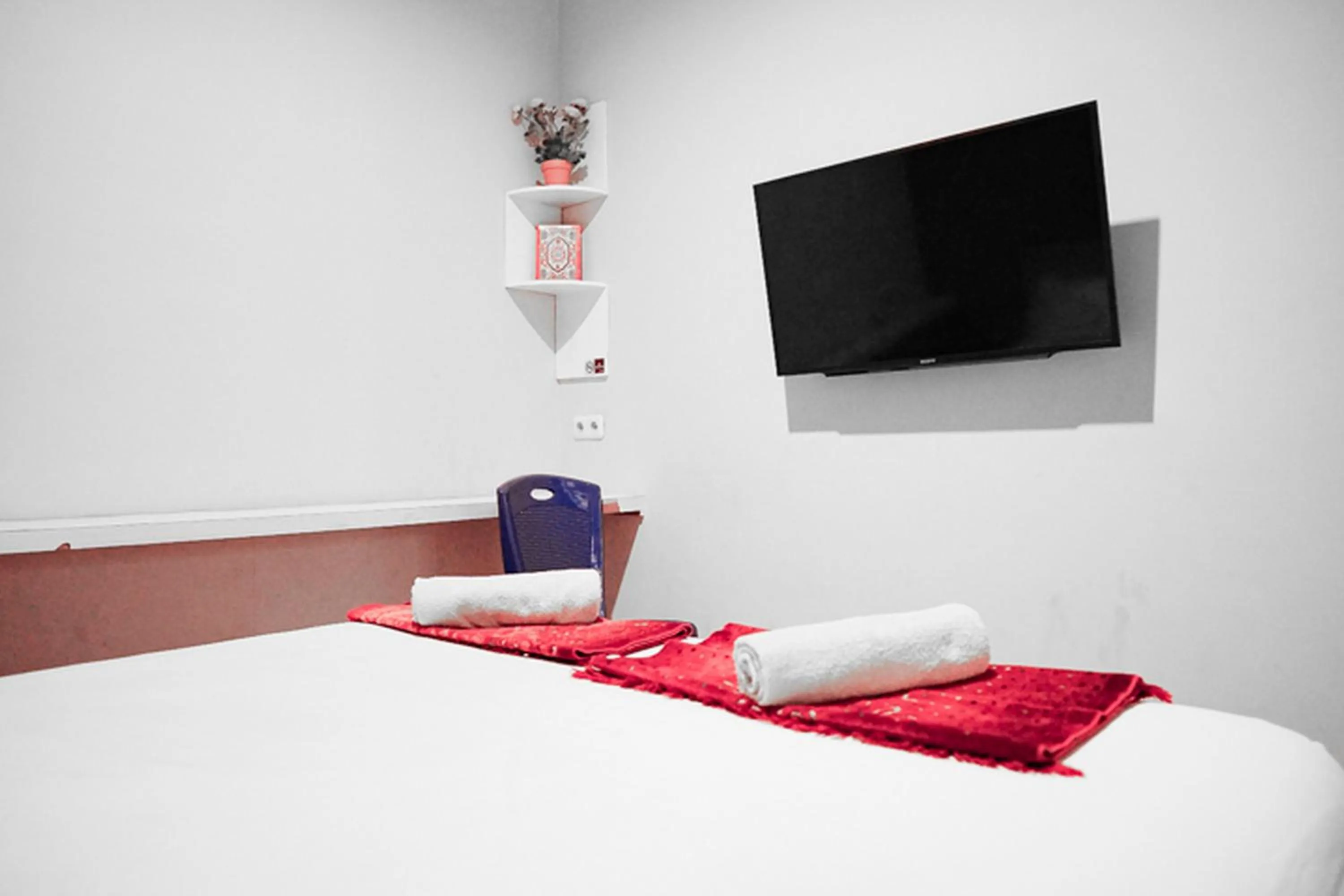 Bed in Audah Syariah Residence Mitra RedDoorz