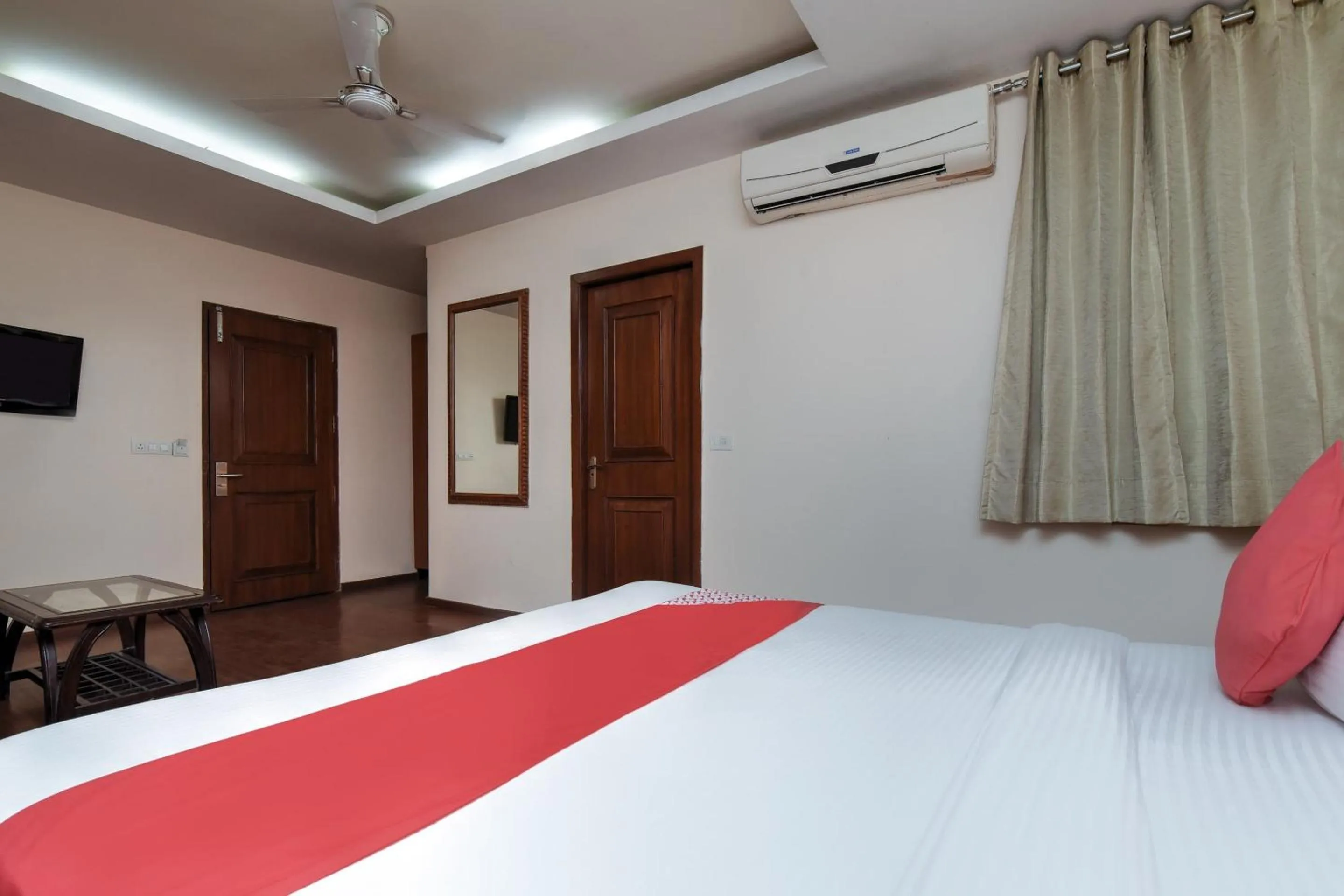 Bedroom in Capital O Corporate Inn