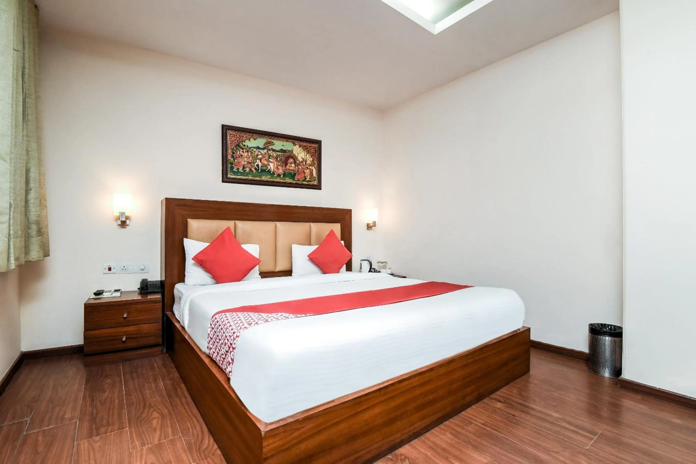 Bedroom in Capital O Corporate Inn