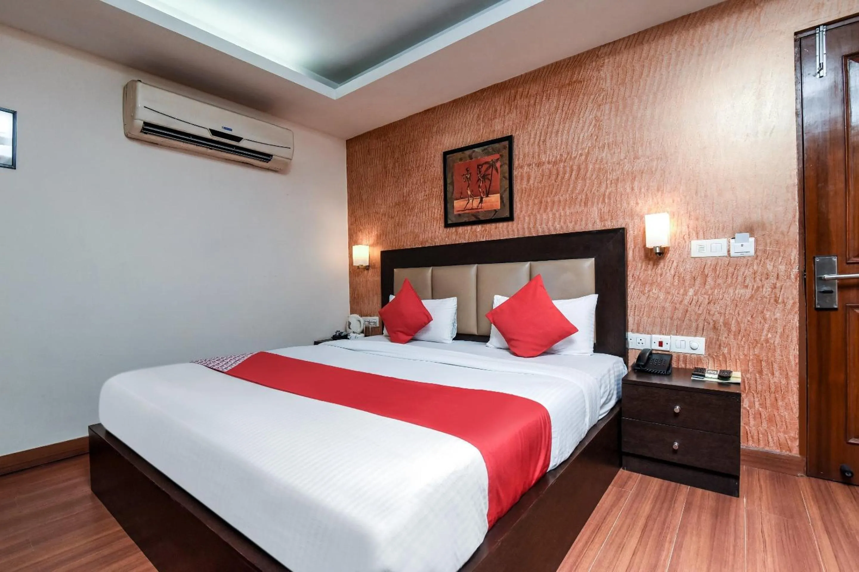 Bedroom in Capital O Corporate Inn