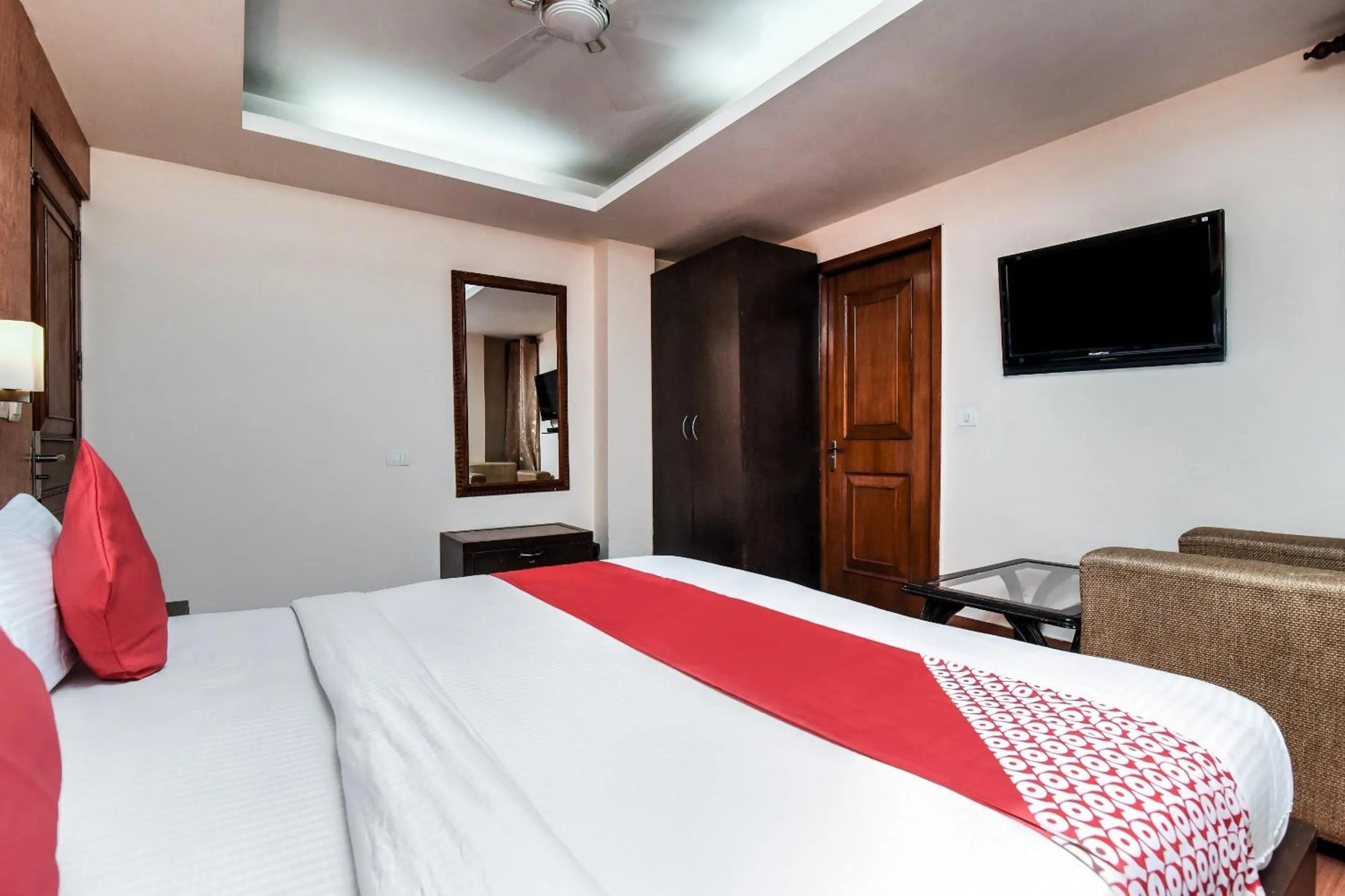 Bedroom in Capital O Corporate Inn