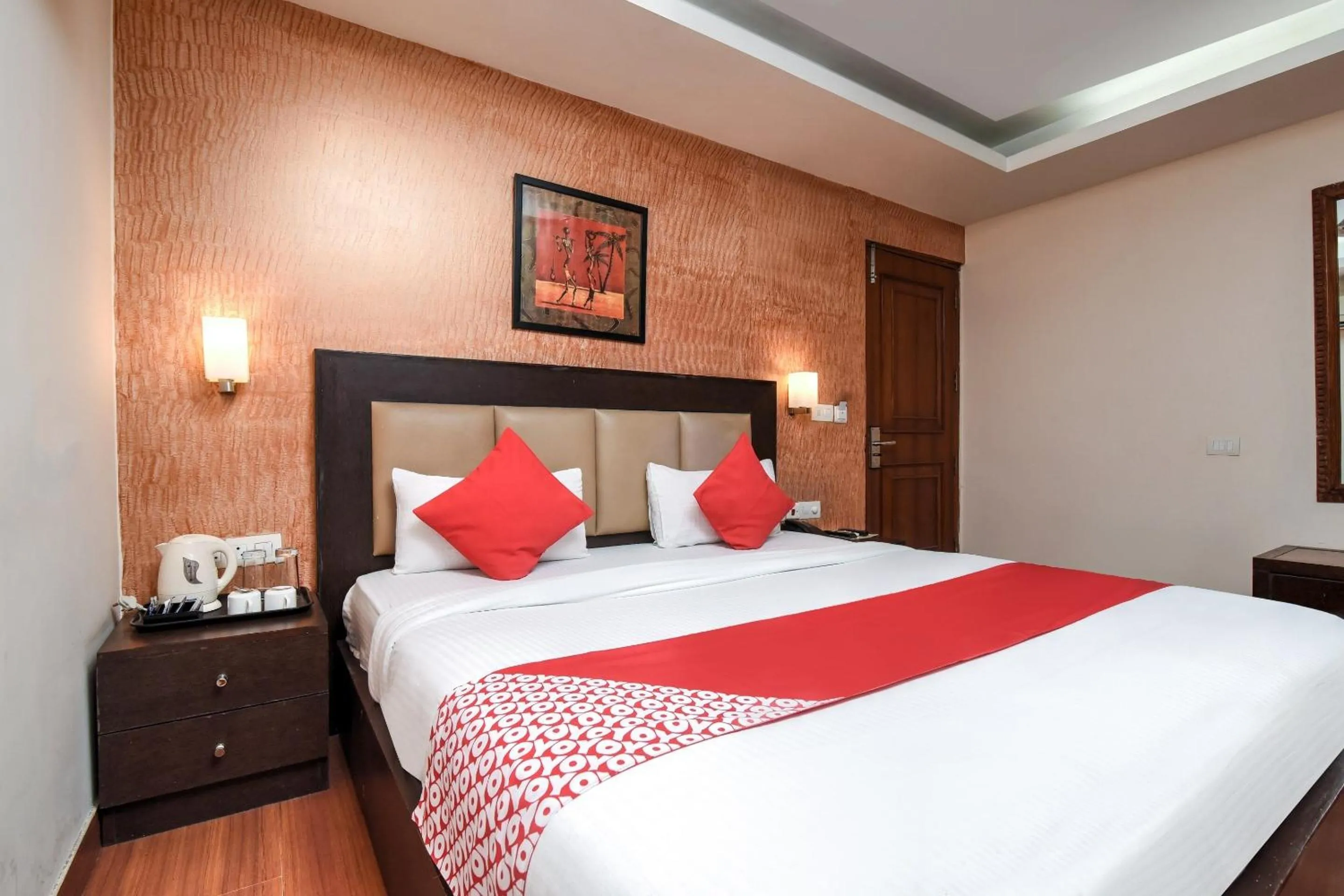 Bedroom in Capital O Corporate Inn