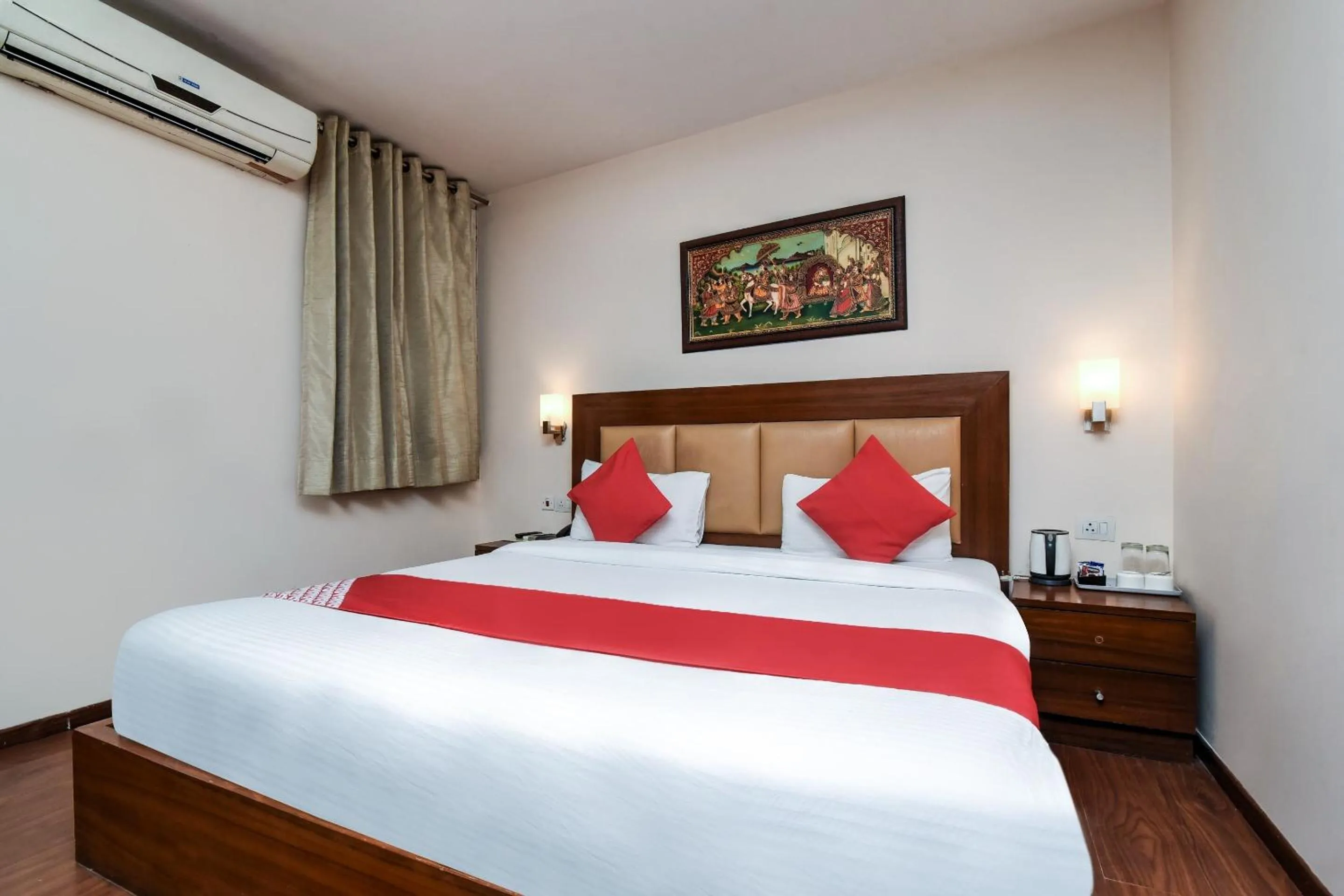 Bedroom in Capital O Corporate Inn