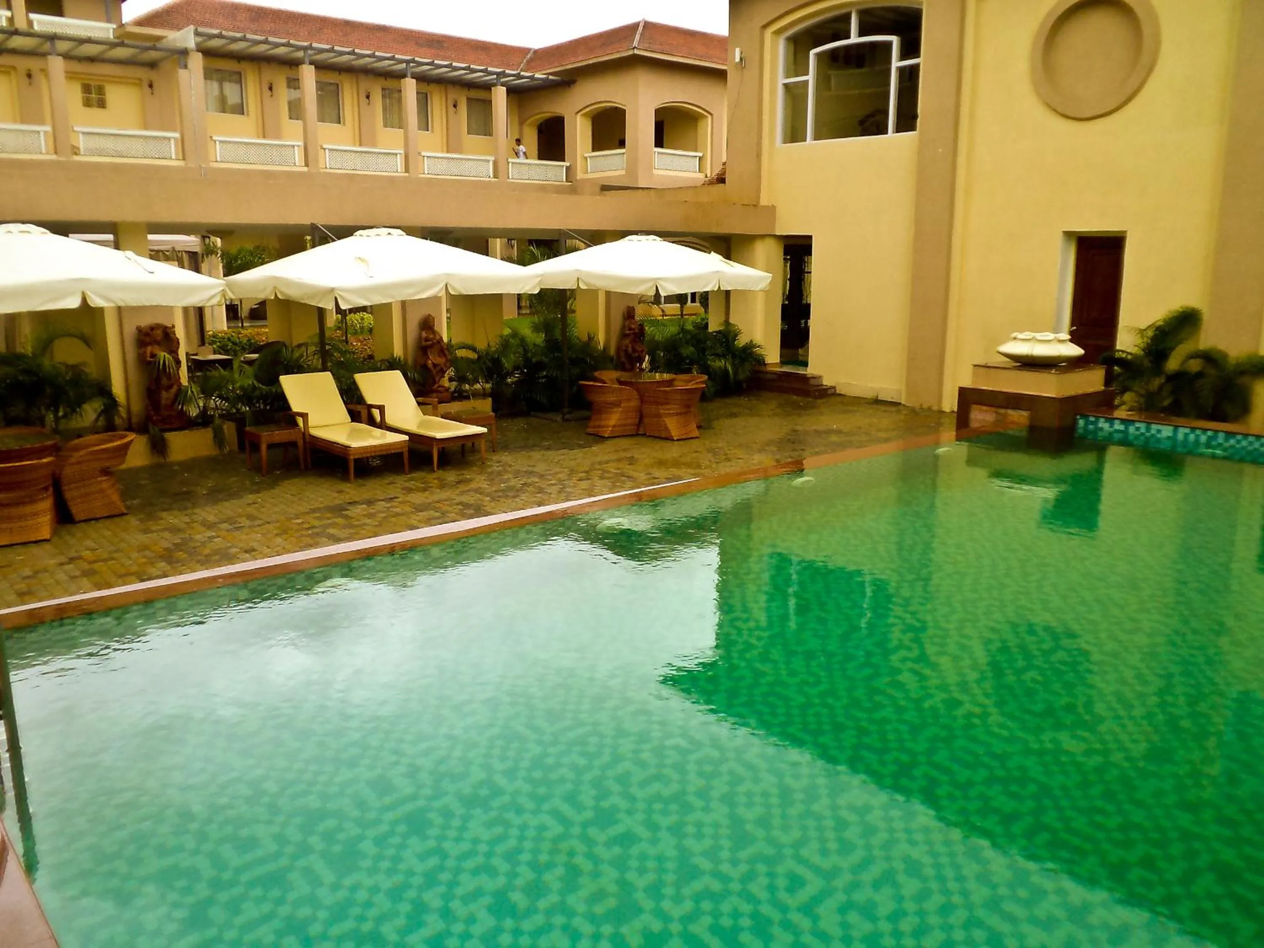 Swimming pool in Pramod Convention & Club Resort