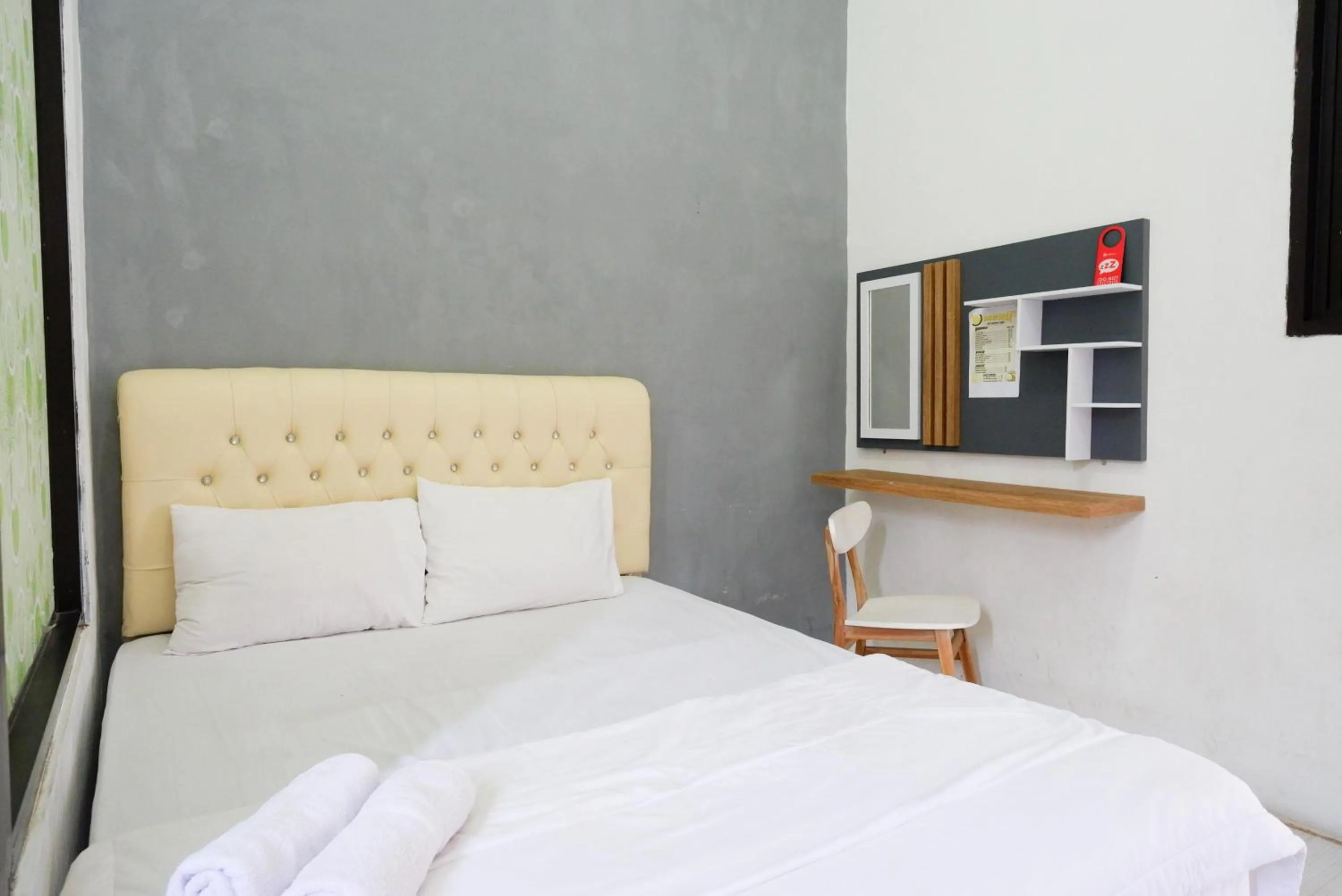 Bedroom, Bed in RedDoorz Syariah near Alun Alun Kajen