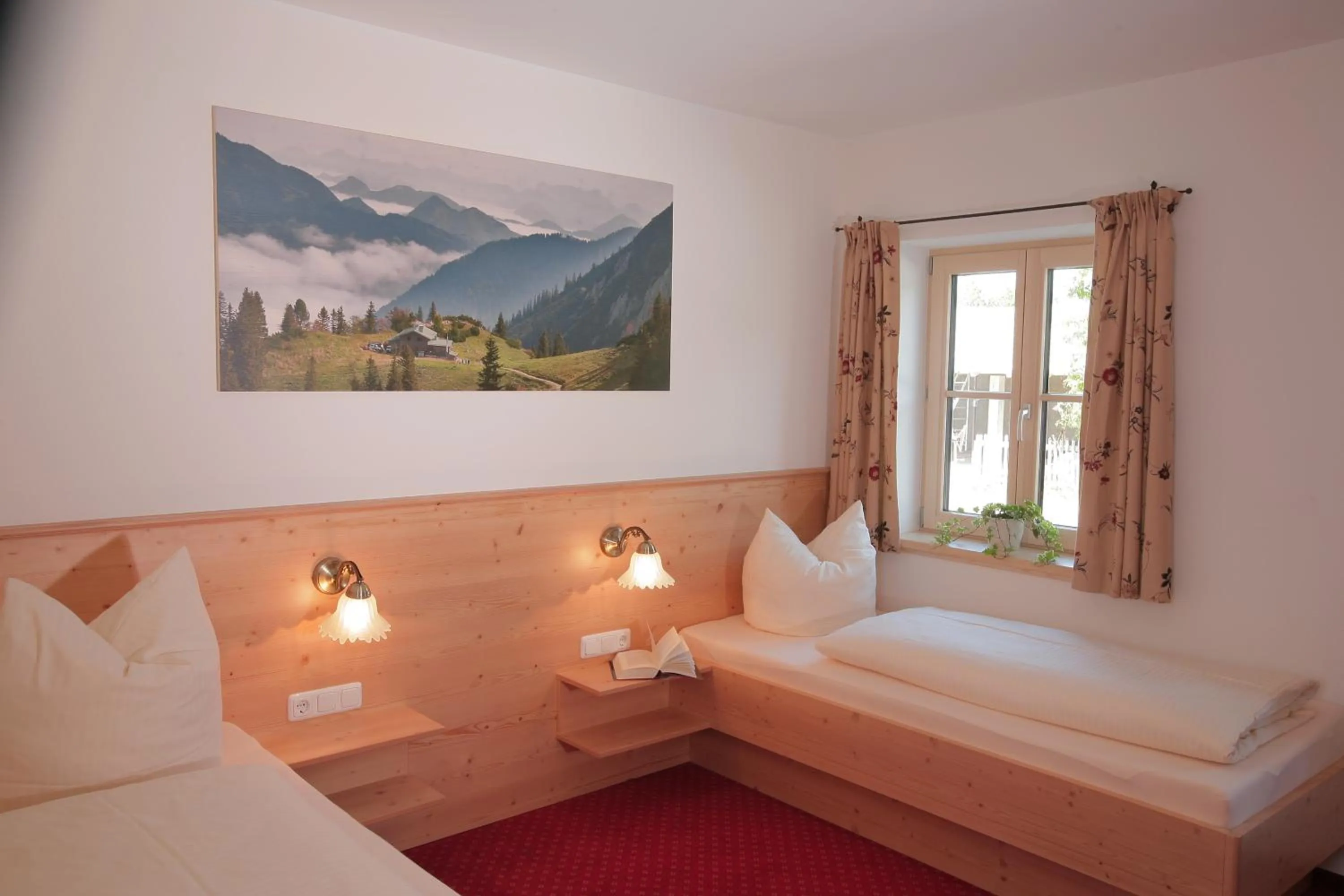 Photo of the whole room, Bed in Pension Schweizerhaus Garni