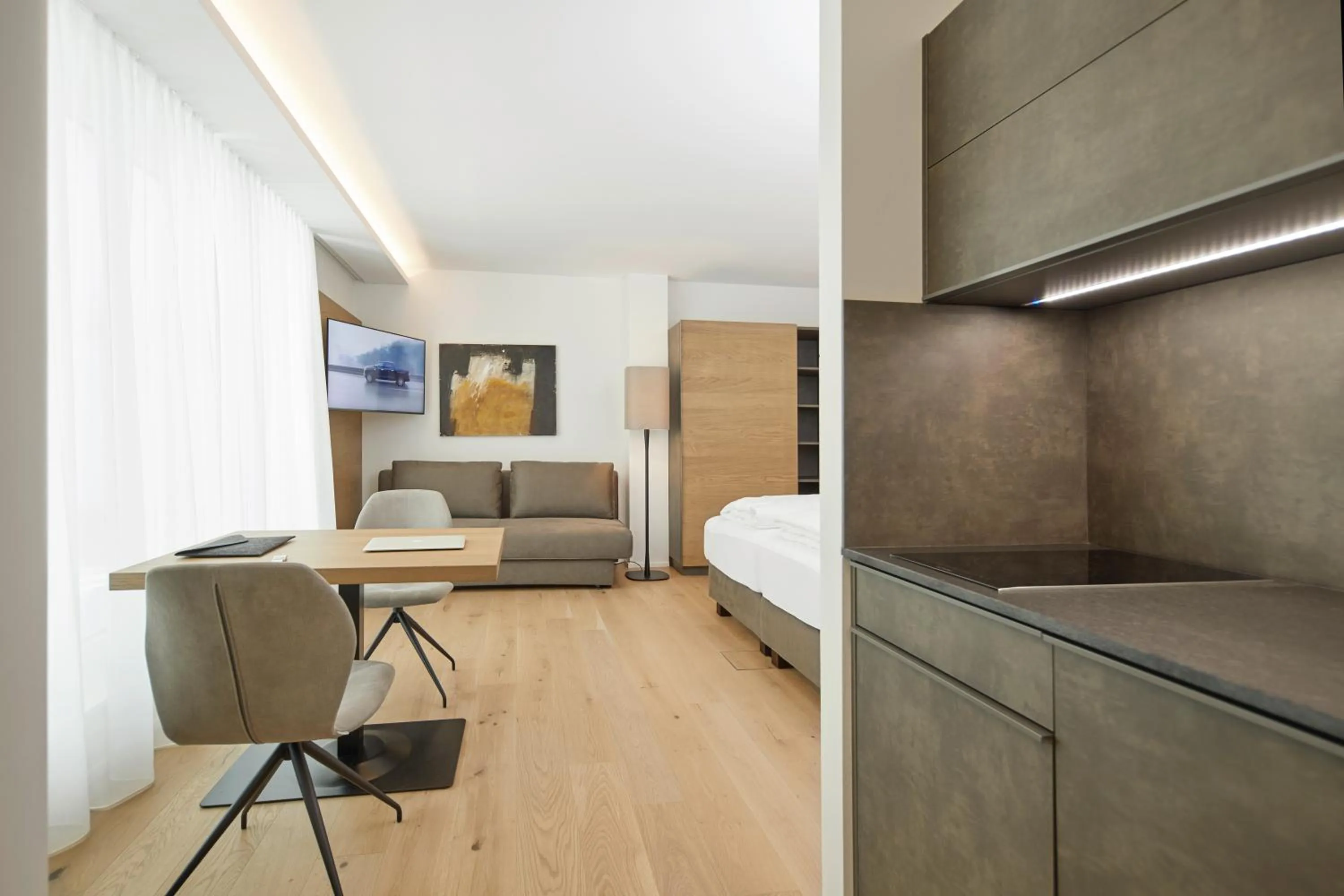 Seating area, Bed in Hotel Gösser Bräu