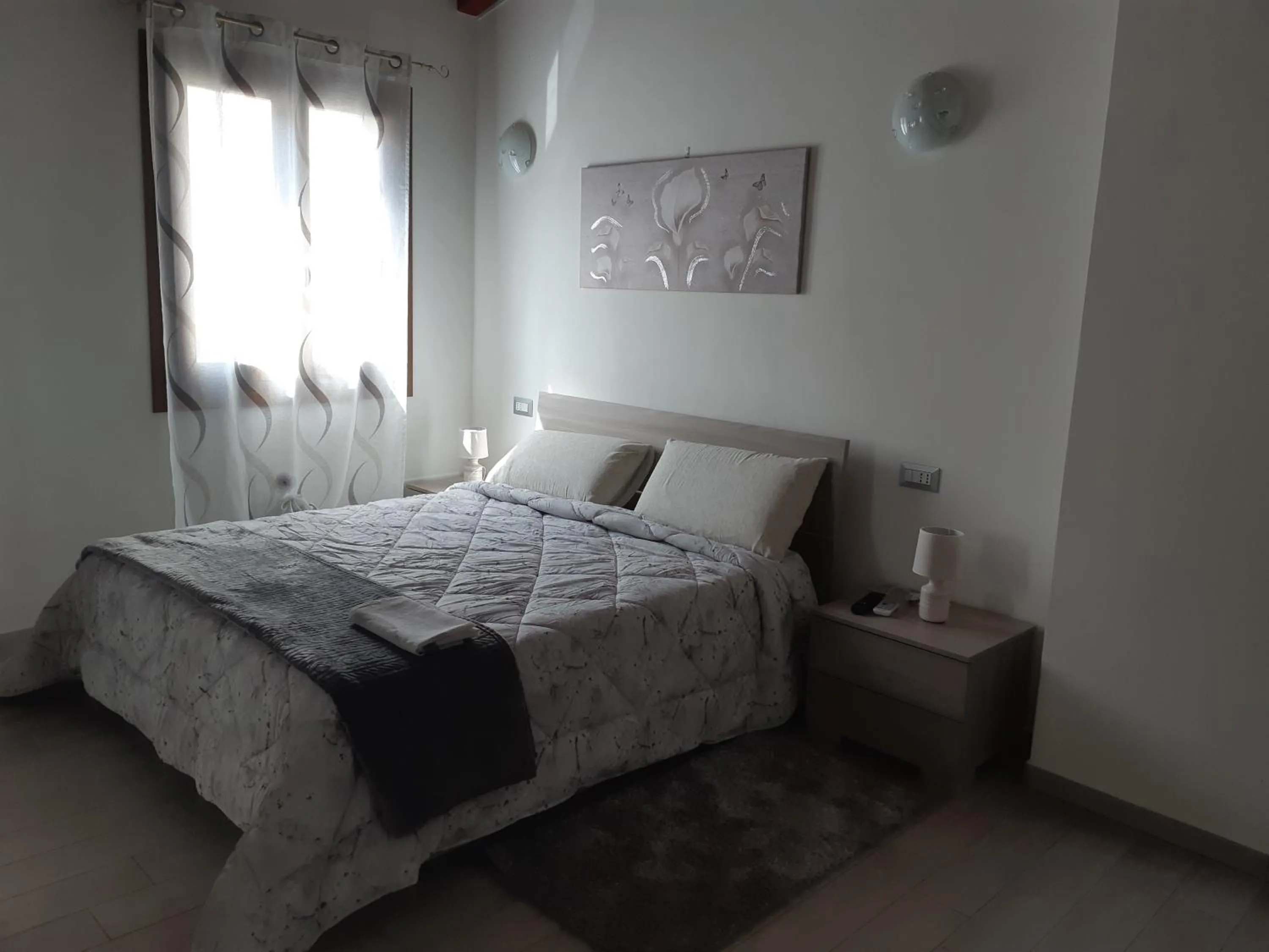 Photo of the whole room, Bed in B&B La Genuina