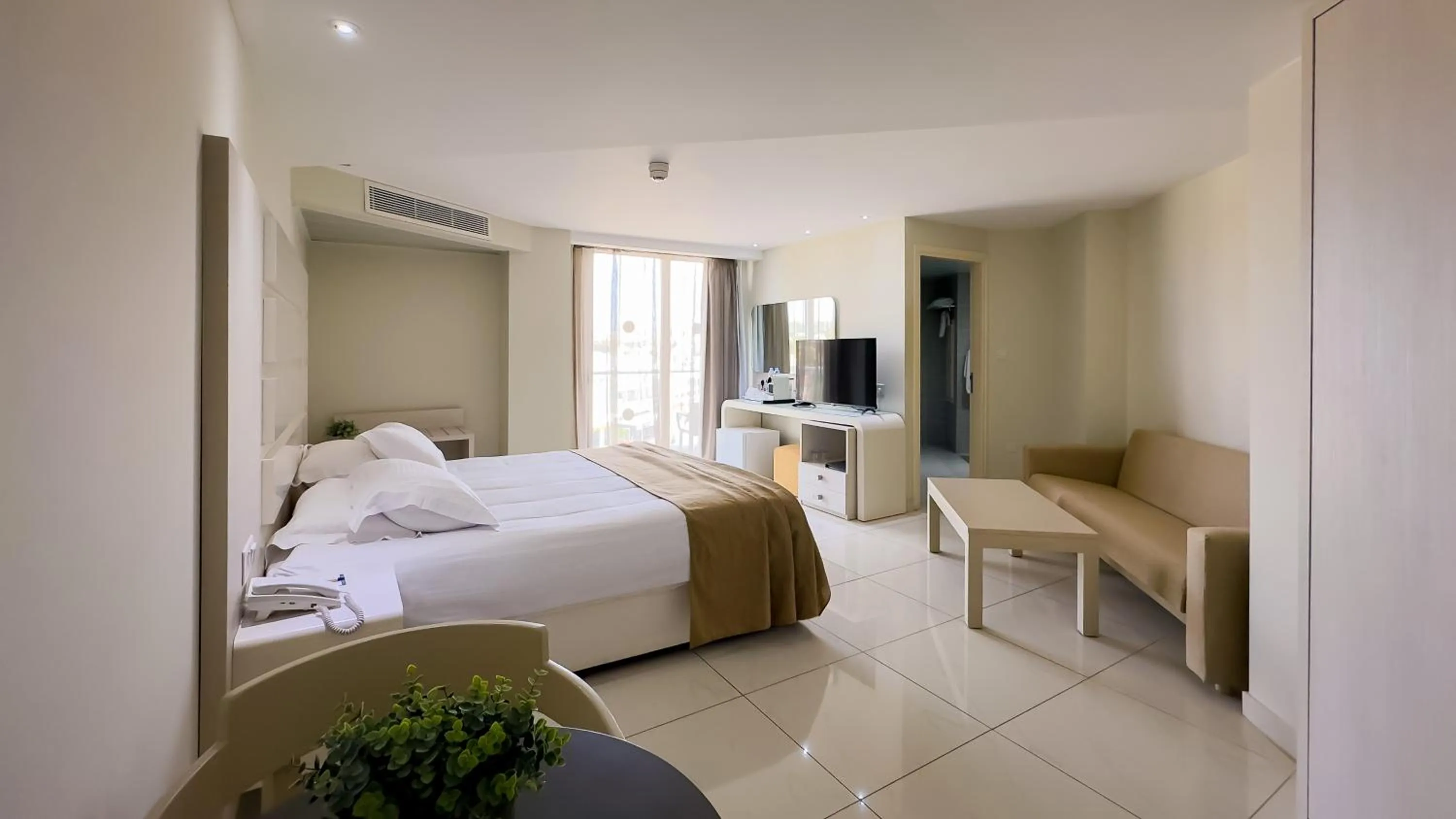 Bed in Tasia Maris Beach Hotel - Adults Only