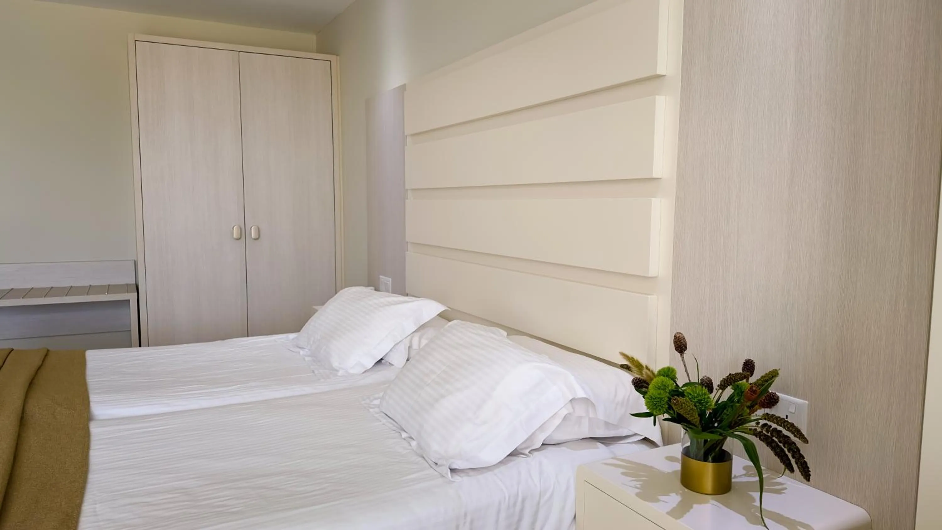 Bed in Tasia Maris Beach Hotel - Adults Only