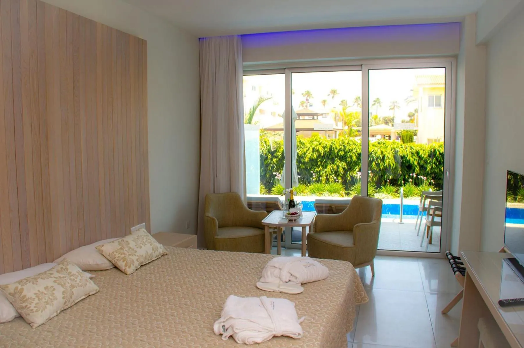 Photo of the whole room, Bed in Tasia Maris Beach Hotel - Adults Only