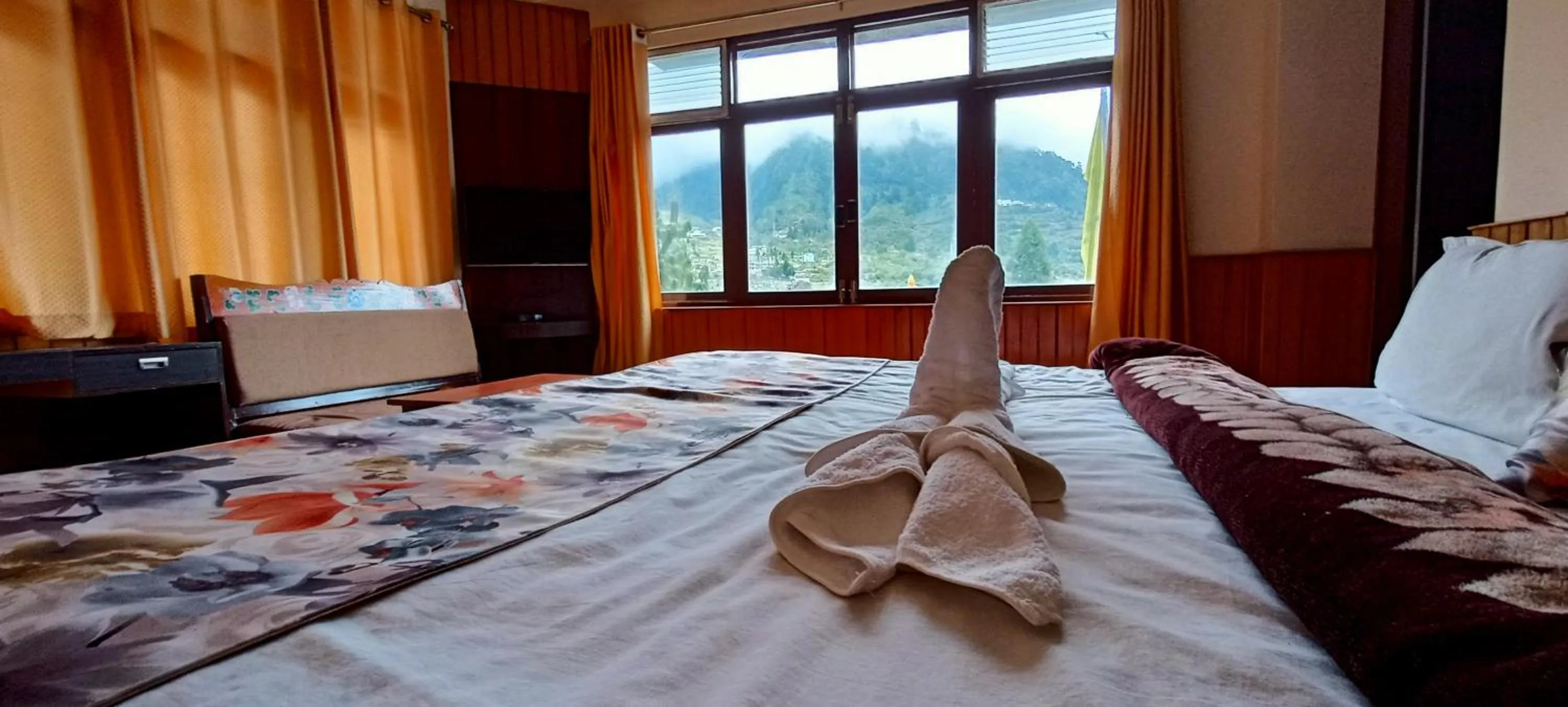 Bed in Le Coxy Resort Lachung