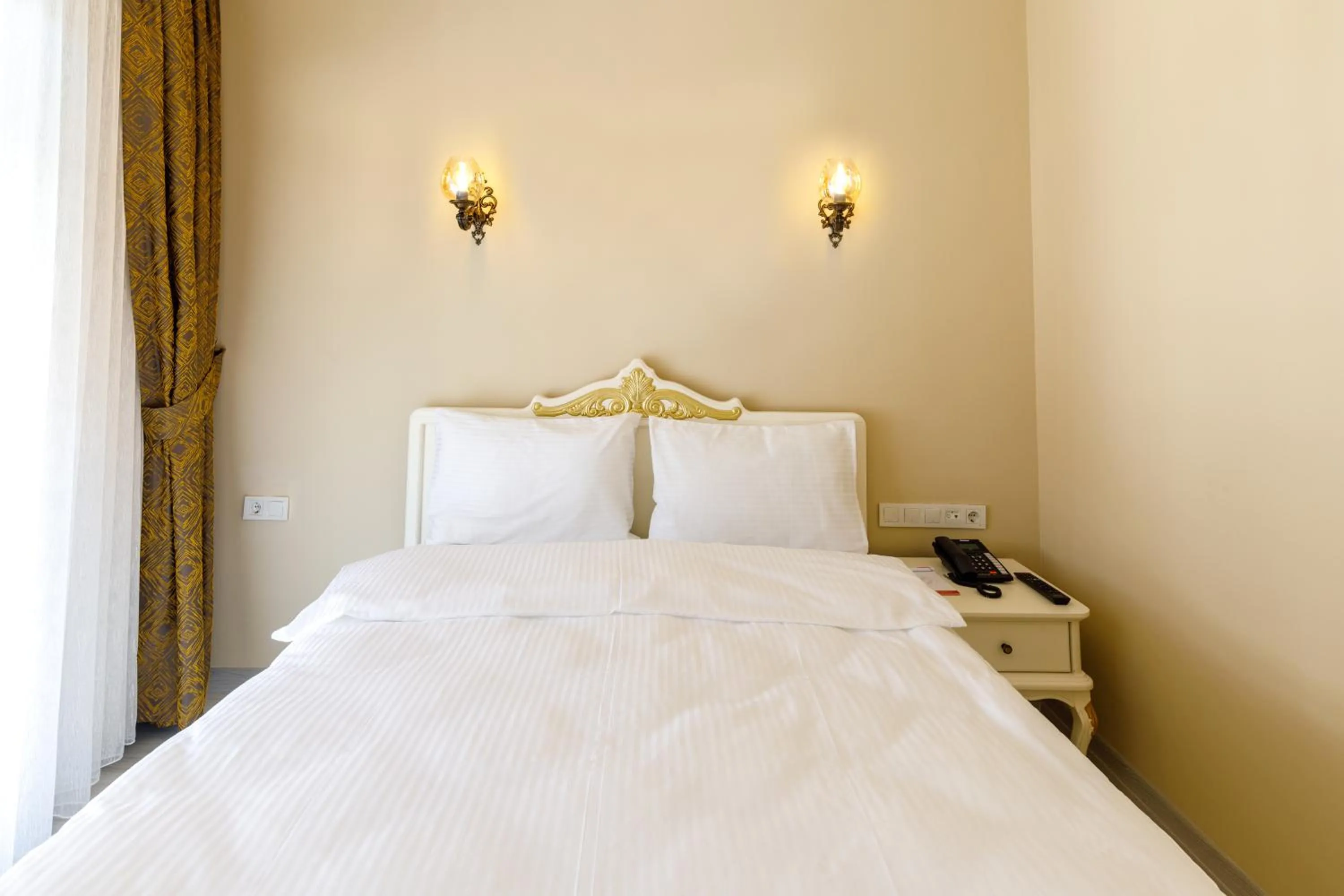 Bed in Germenicia Hotel
