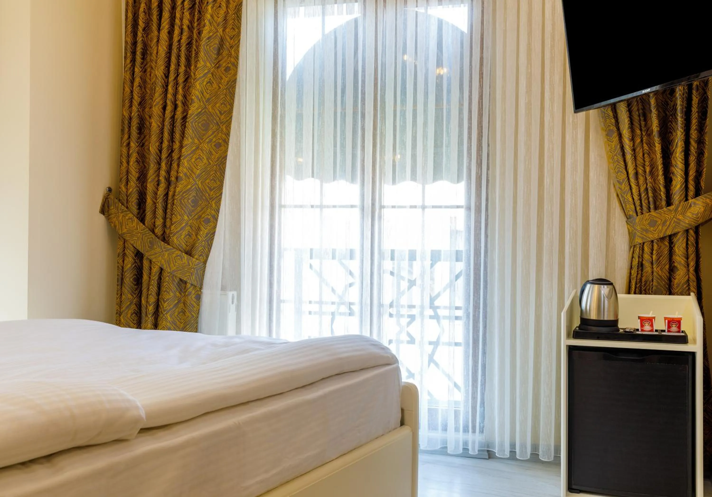 Communal lounge/ TV room in Germenicia Hotel