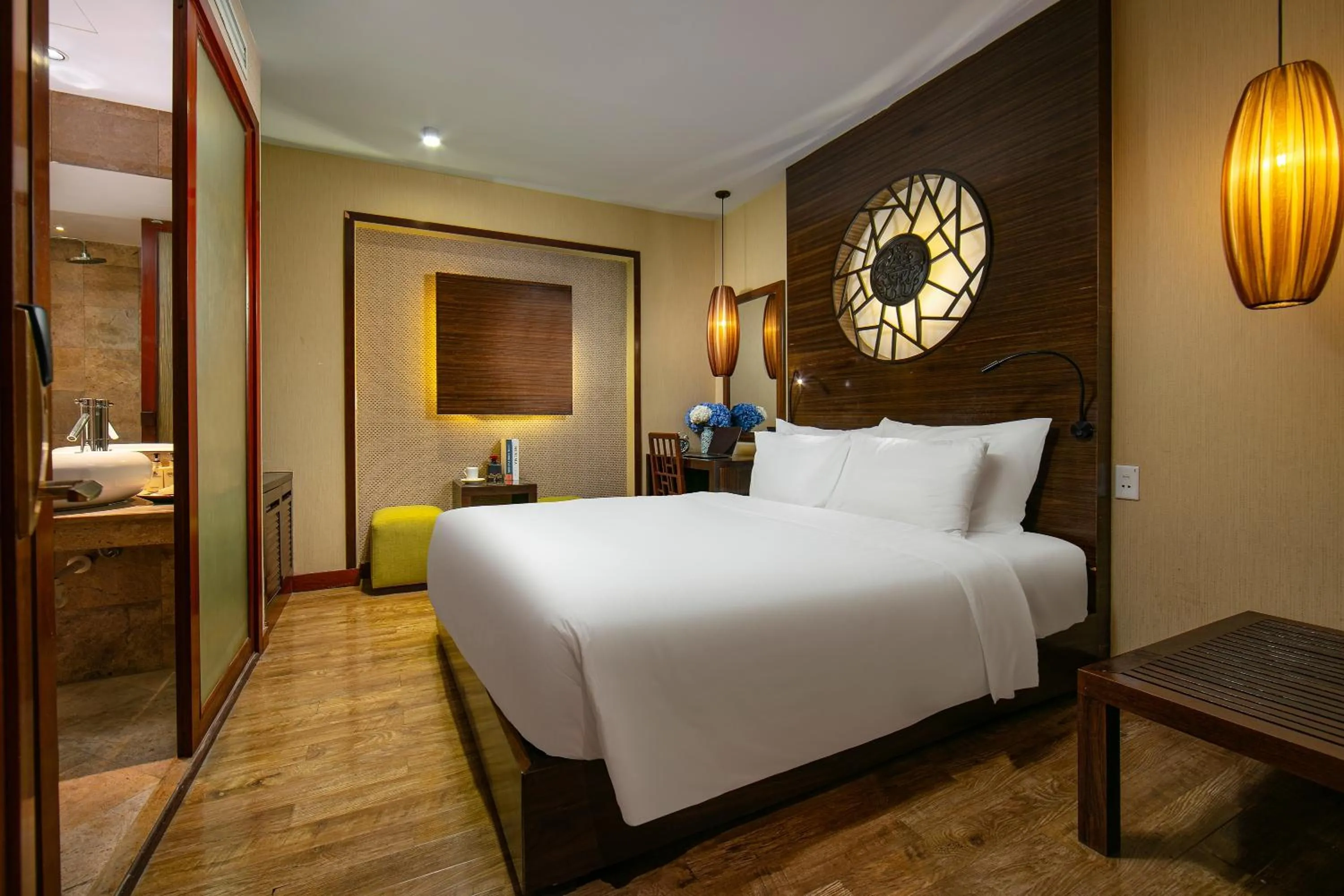 Bed in Oriental Suites Hotel & Spa