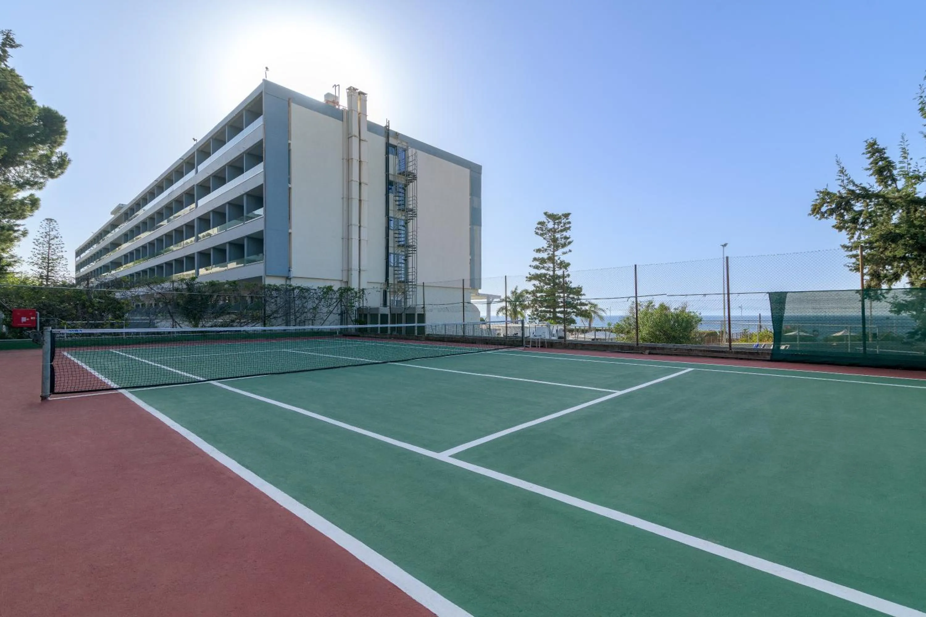 Tennis court in Oceanis Beach Hotel