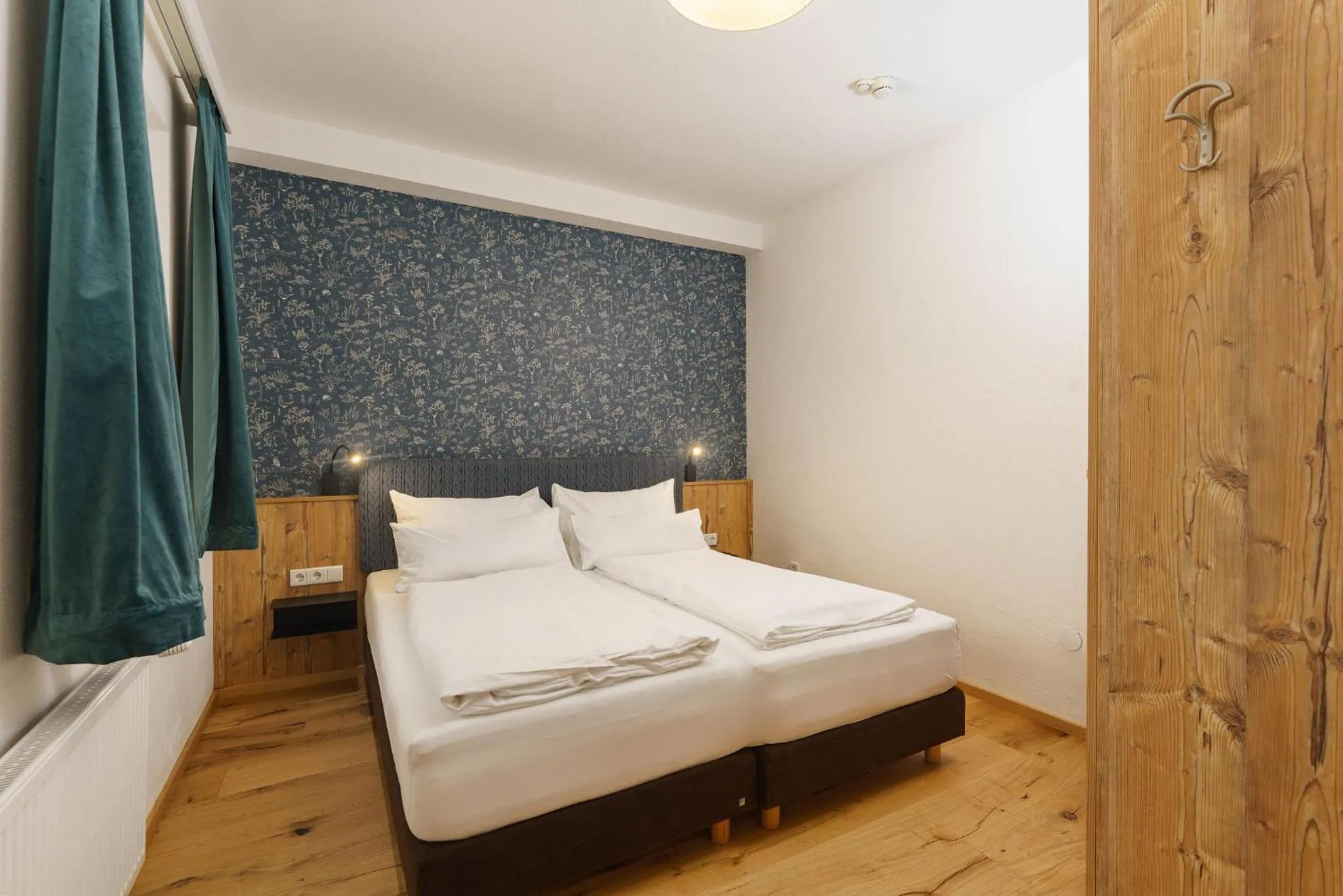 Bed in Appartements Landhaus Hubertus Wellness & Breakfast